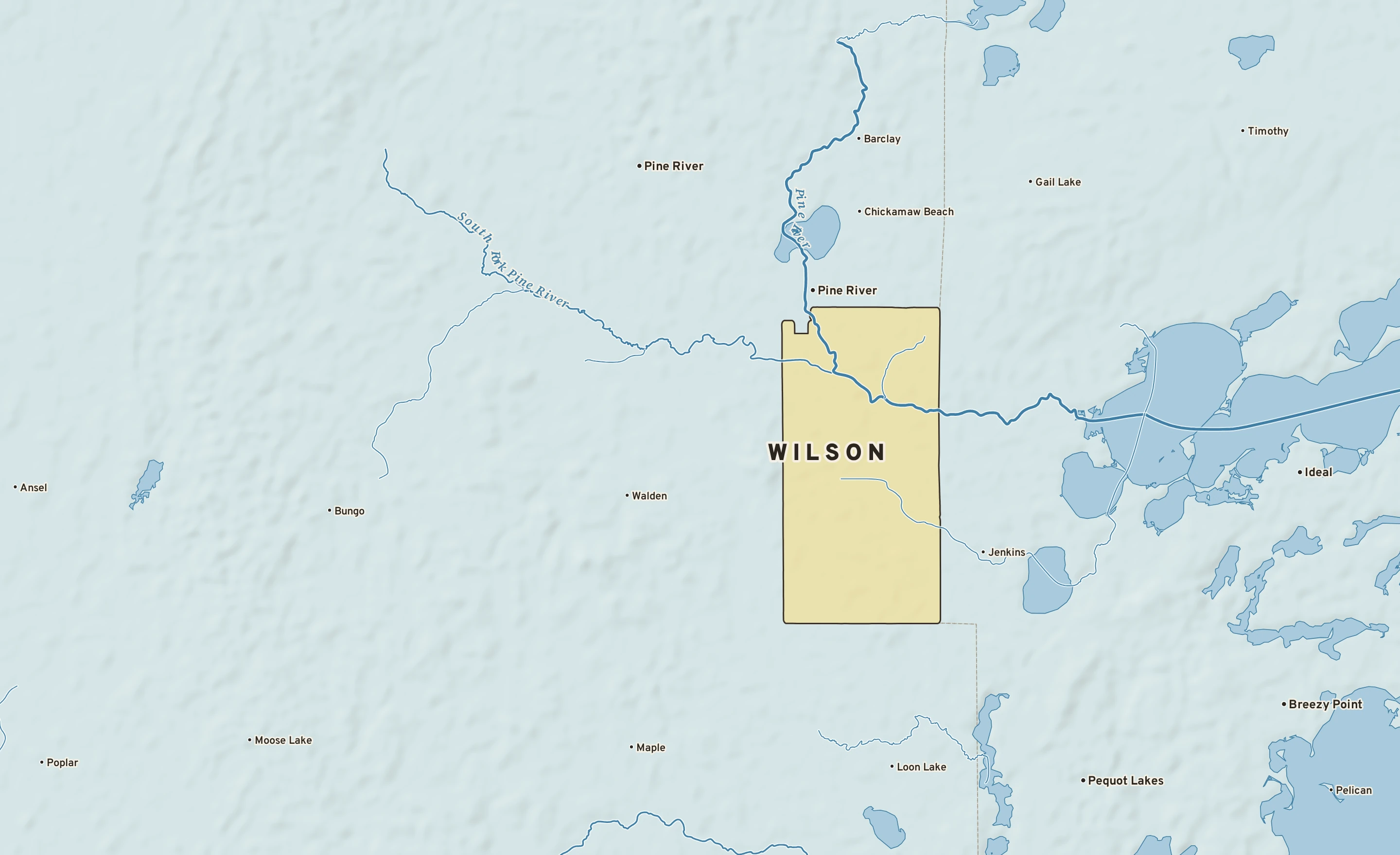 Shaded-relief atlas plate of Wilson, Minnesota: rivers, roads, the city limits and where the water drains.