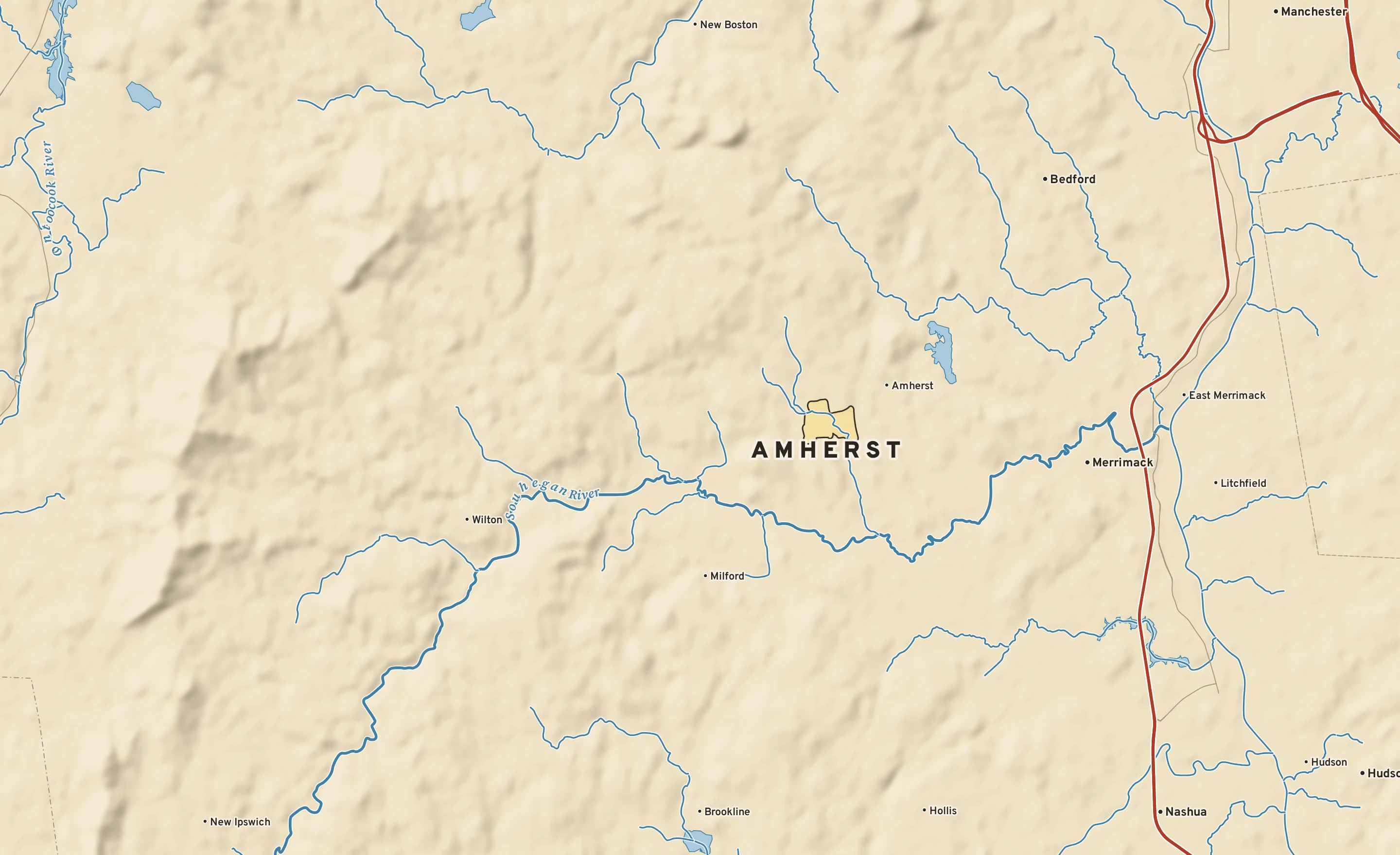 Shaded-relief atlas plate of Amherst, New Hampshire: rivers, roads, the city limits and where the water drains.