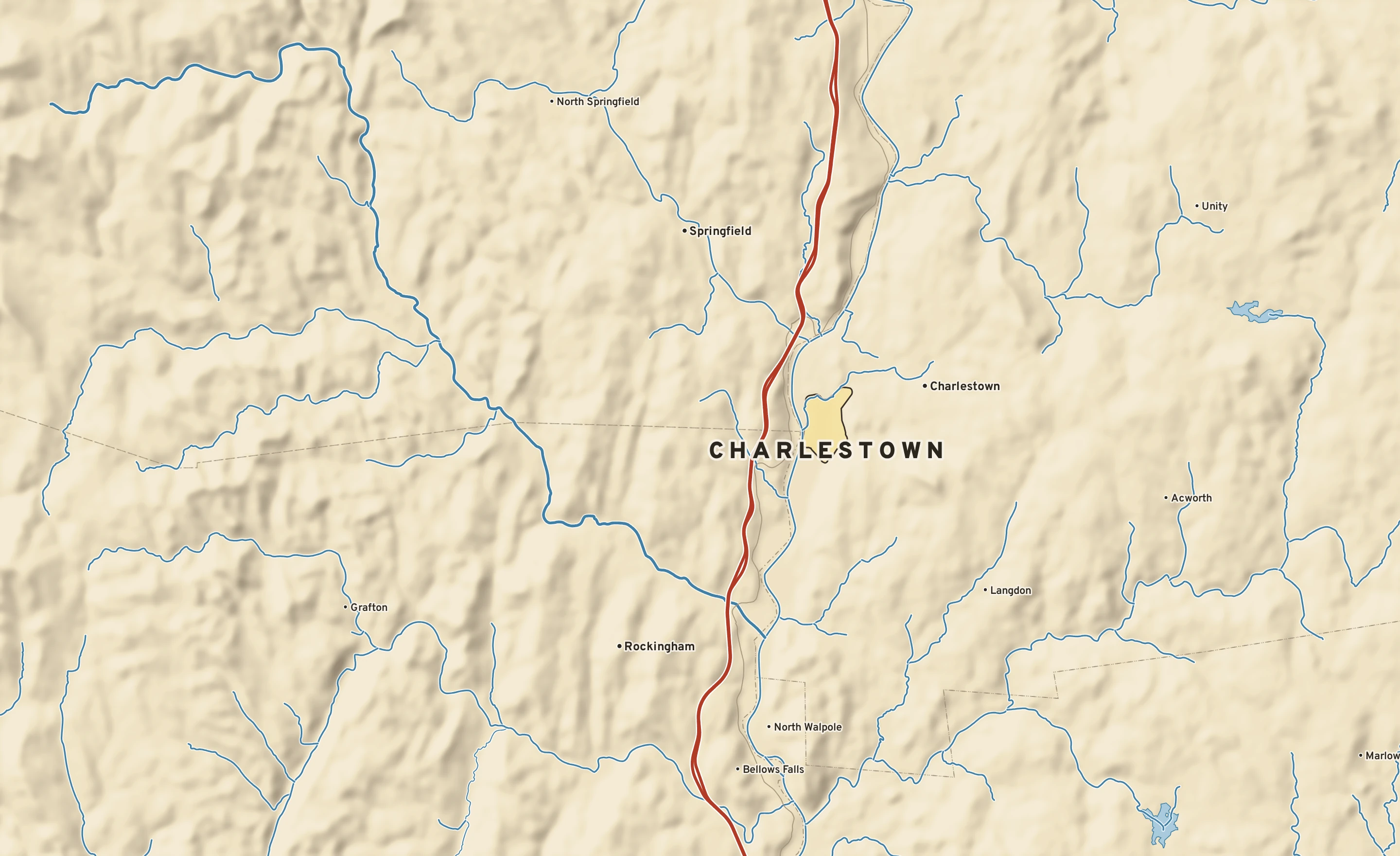 Shaded-relief atlas plate of Charlestown, New Hampshire: rivers, roads, the city limits and where the water drains.