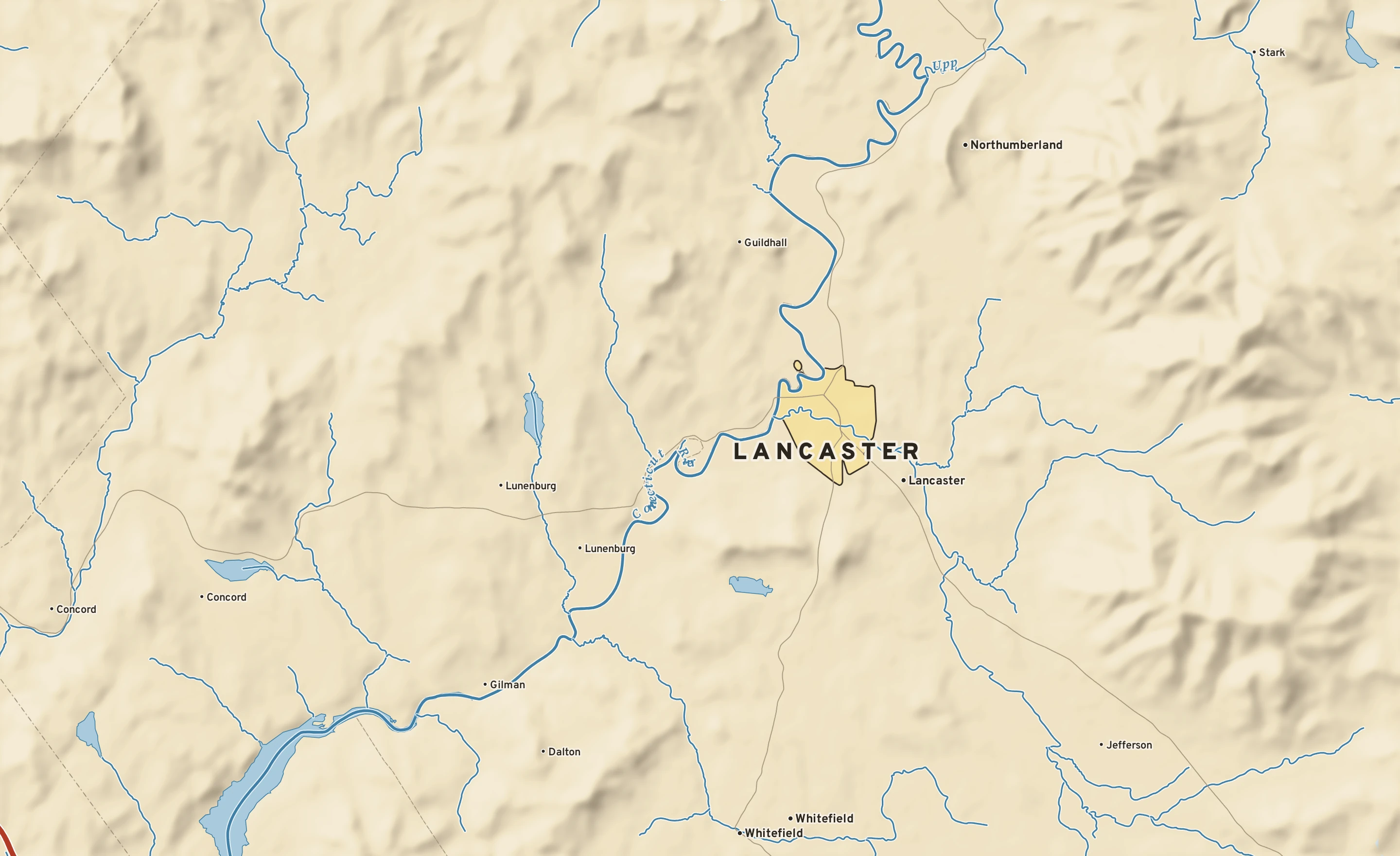 Shaded-relief atlas plate of Lancaster, New Hampshire: rivers, roads, the city limits and where the water drains.