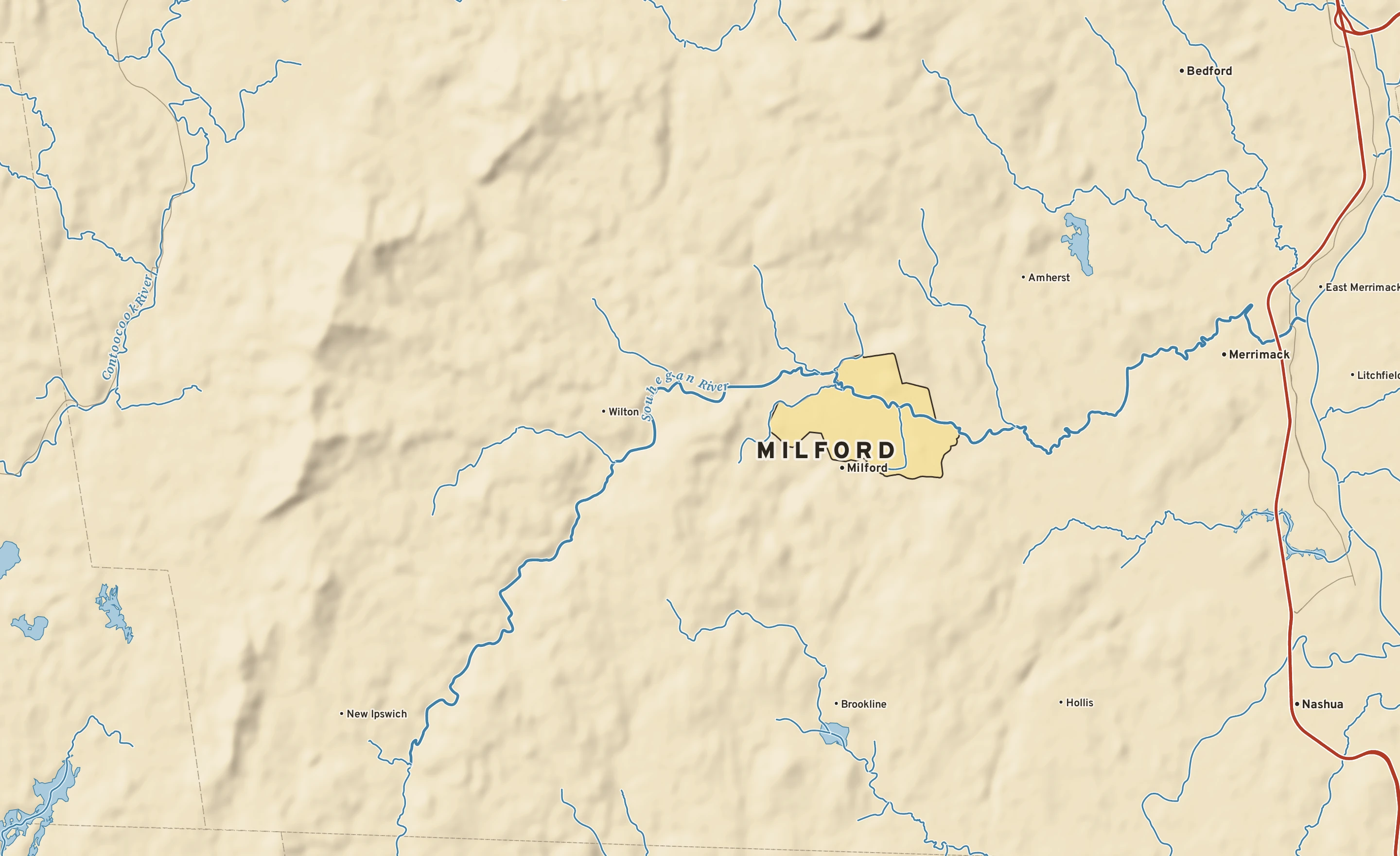 Shaded-relief atlas plate of Milford, New Hampshire: rivers, roads, the city limits and where the water drains.