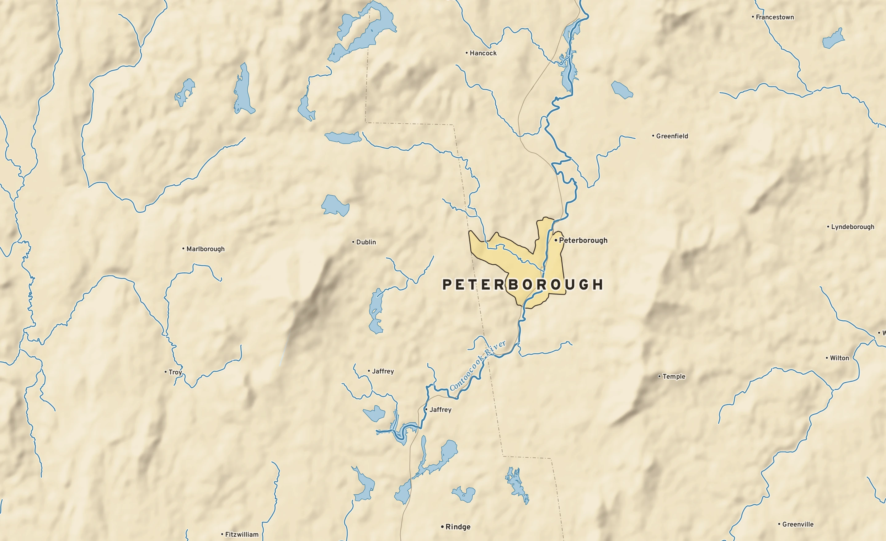 Shaded-relief atlas plate of Peterborough, New Hampshire: rivers, roads, the city limits and where the water drains.