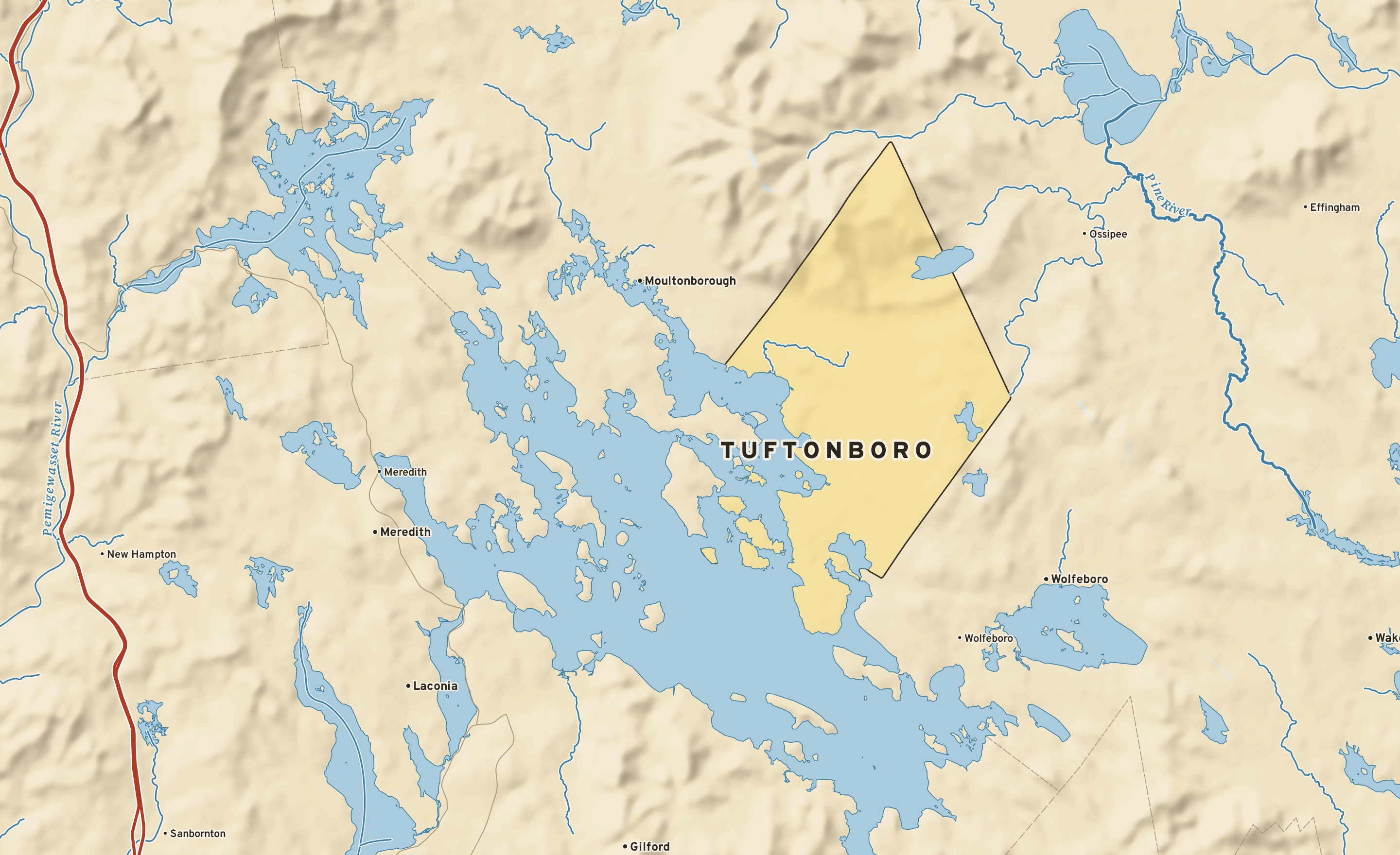 Shaded-relief atlas plate of Tuftonboro, New Hampshire: rivers, roads, the city limits and where the water drains.