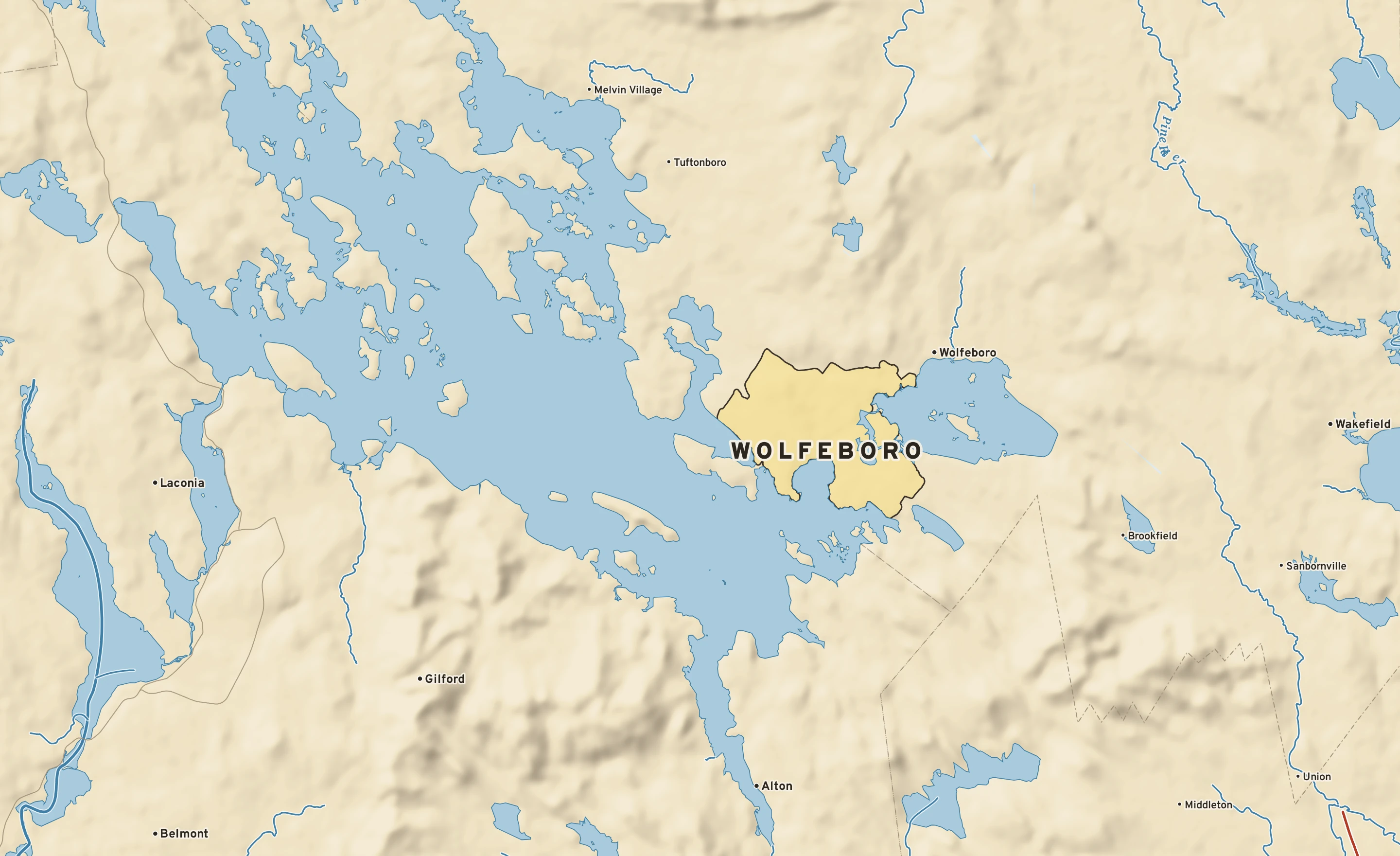Shaded-relief atlas plate of Wolfeboro, New Hampshire: rivers, roads, the city limits and where the water drains.