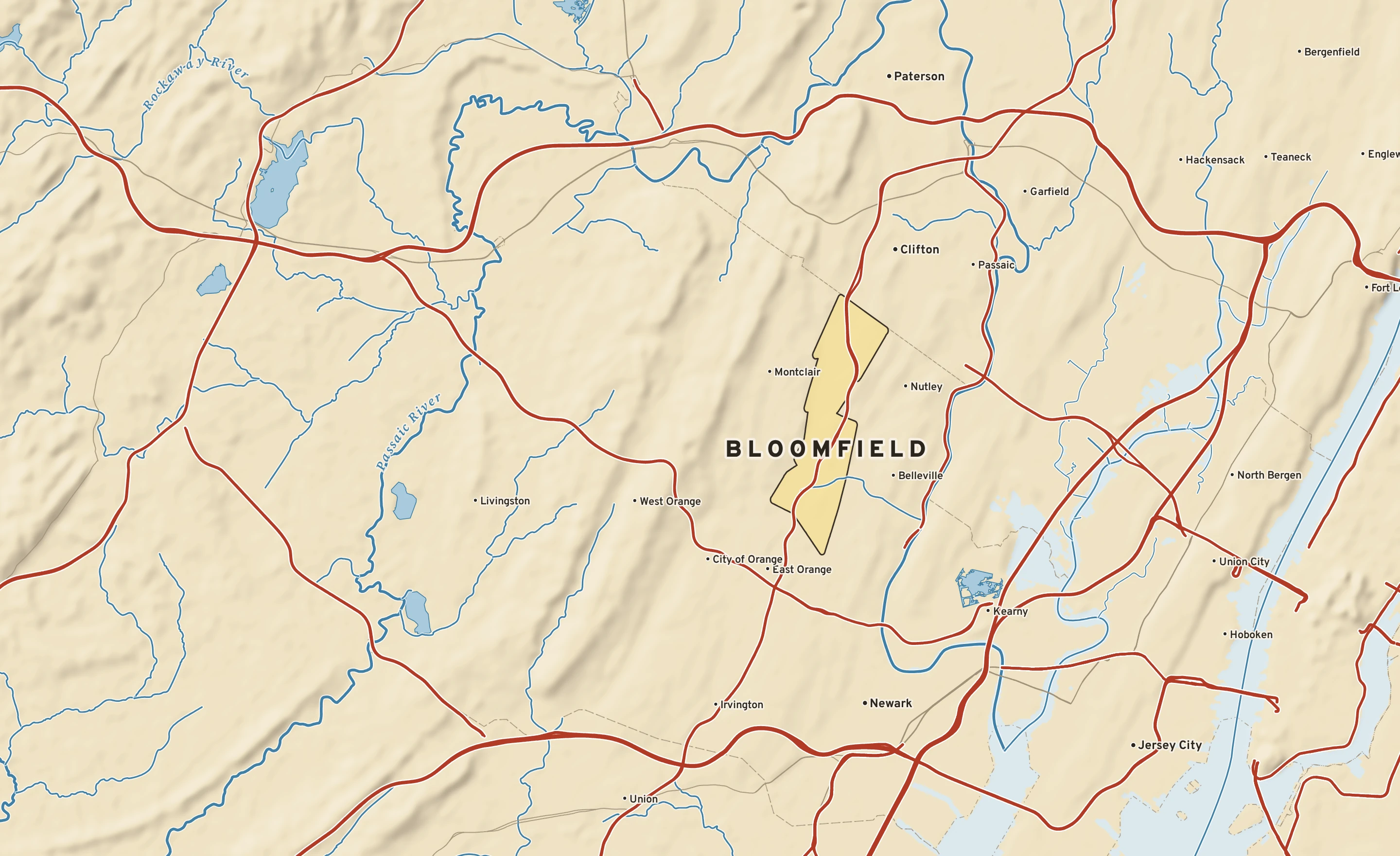 Shaded-relief atlas plate of Bloomfield, New Jersey: rivers, roads, the city limits and where the water drains.