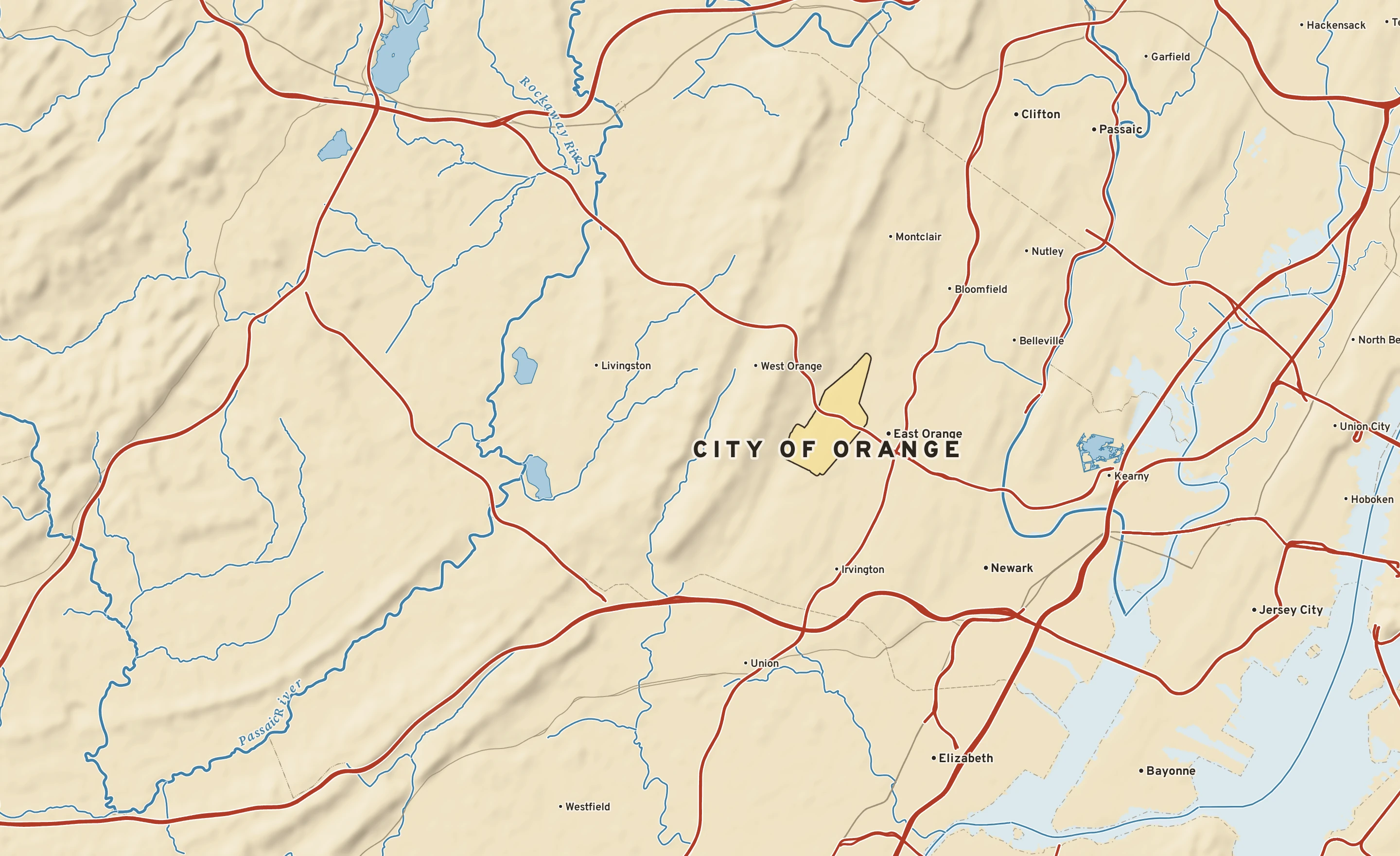 Shaded-relief atlas plate of City of Orange, New Jersey: rivers, roads, the city limits and where the water drains.
