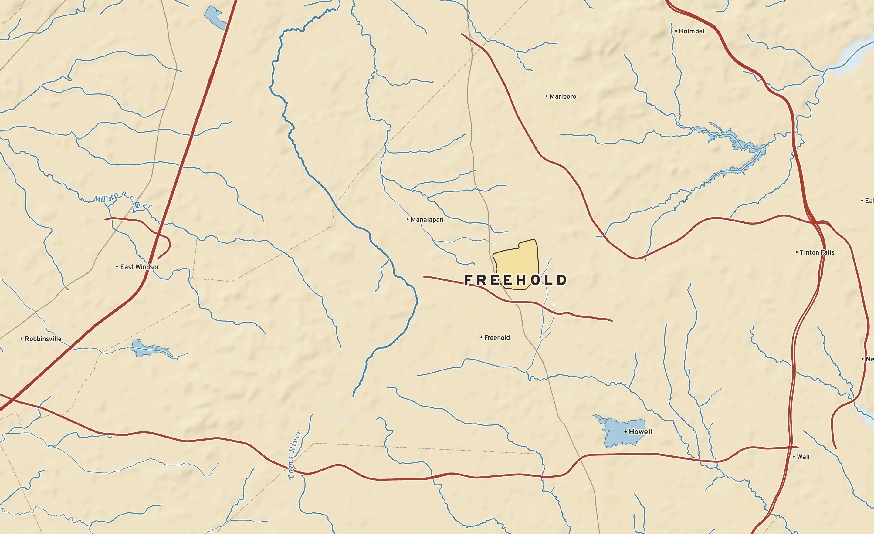 Shaded-relief atlas plate of Freehold, New Jersey: rivers, roads, the city limits and where the water drains.