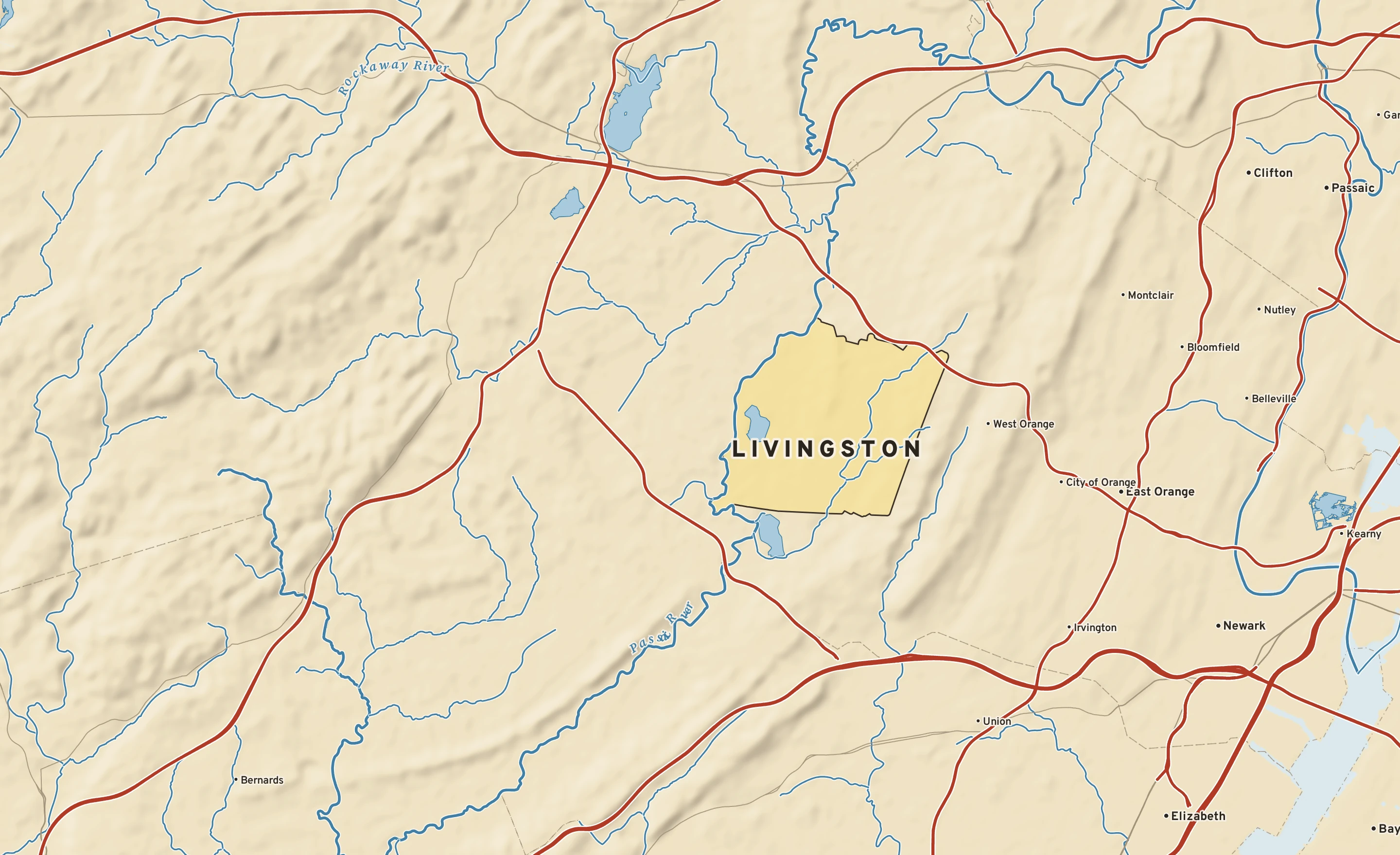 Shaded-relief atlas plate of Livingston, New Jersey: rivers, roads, the city limits and where the water drains.