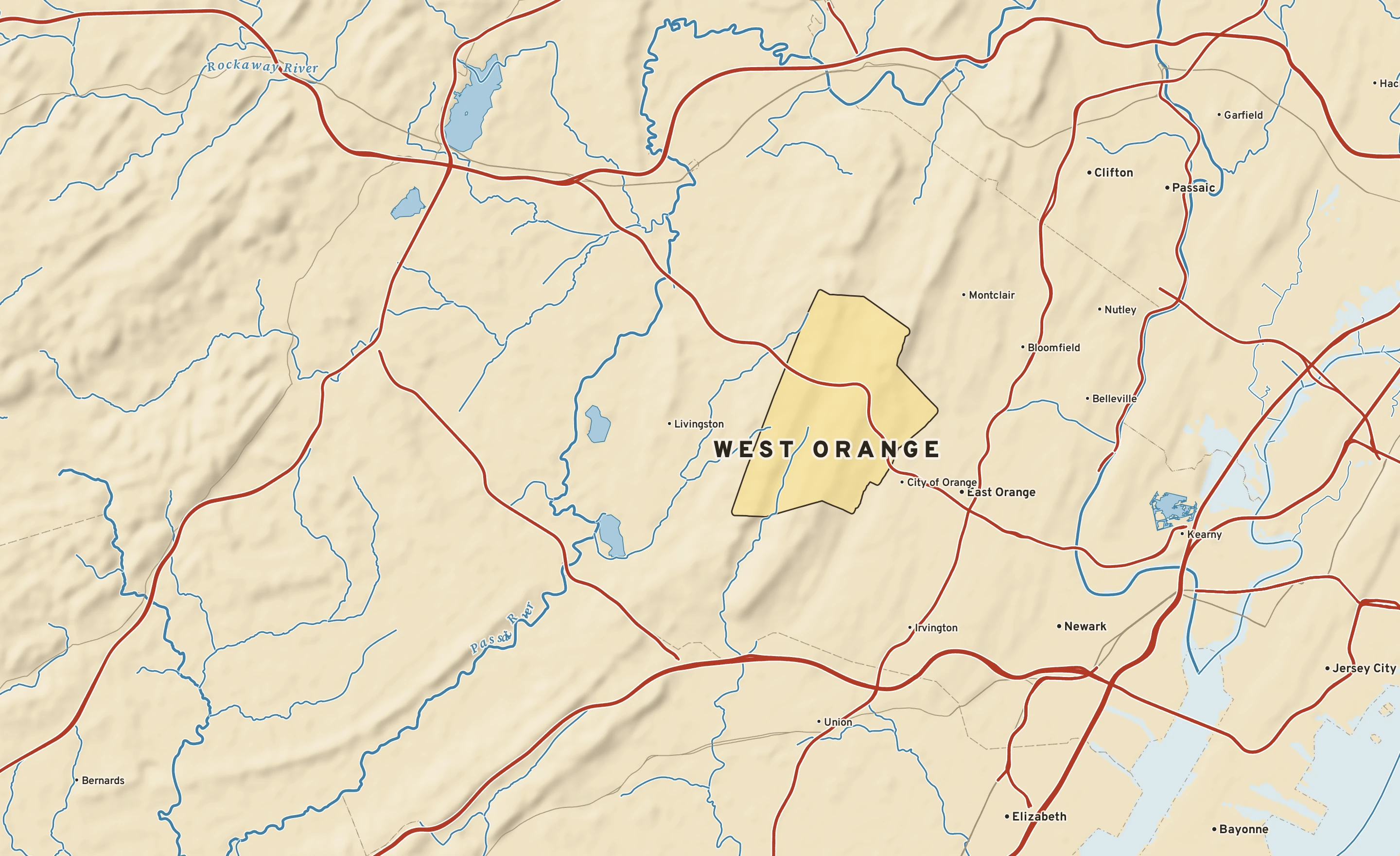 Shaded-relief atlas plate of West Orange, New Jersey: rivers, roads, the city limits and where the water drains.