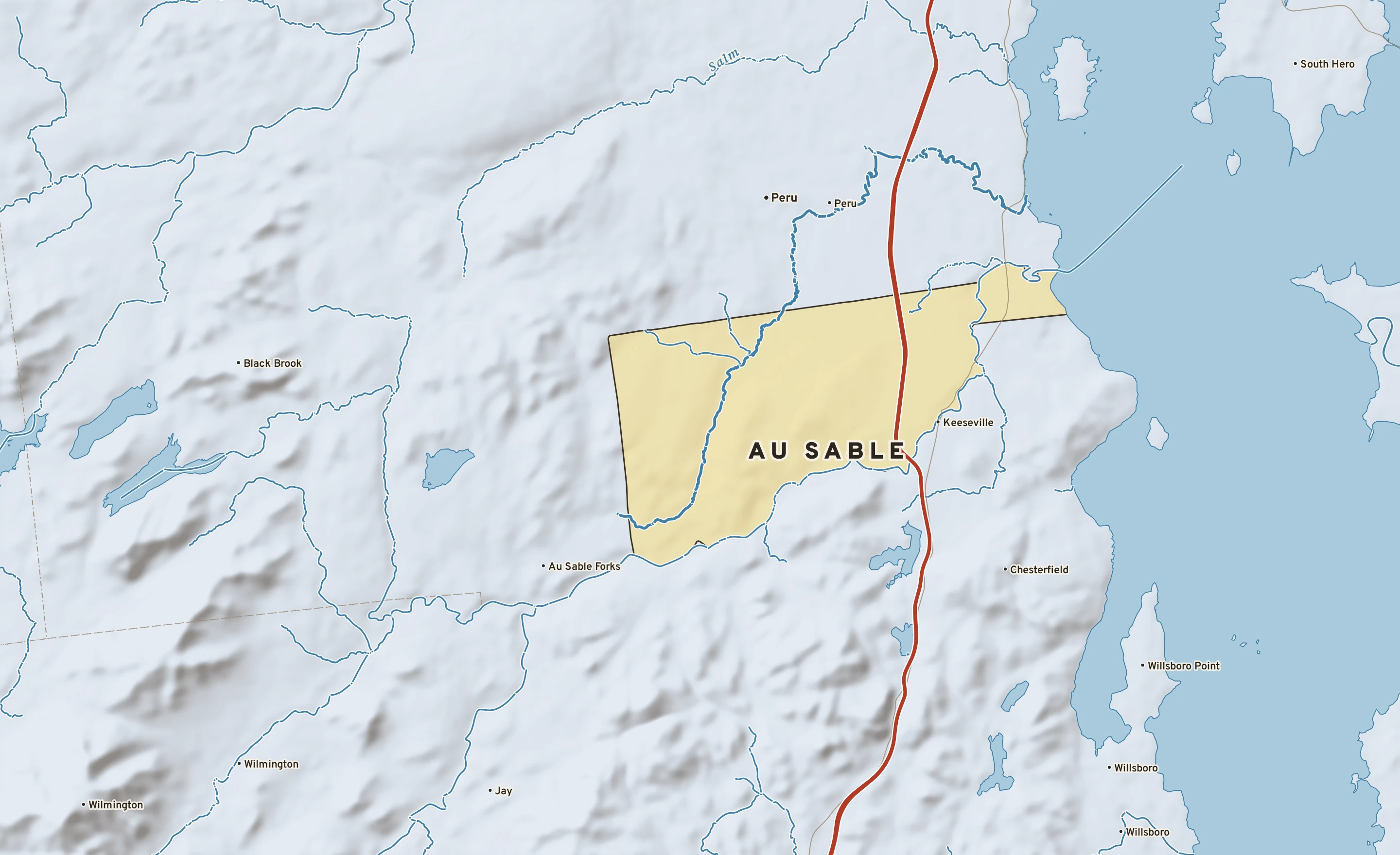 Shaded-relief atlas plate of Au Sable, New York: rivers, roads, the city limits and where the water drains.