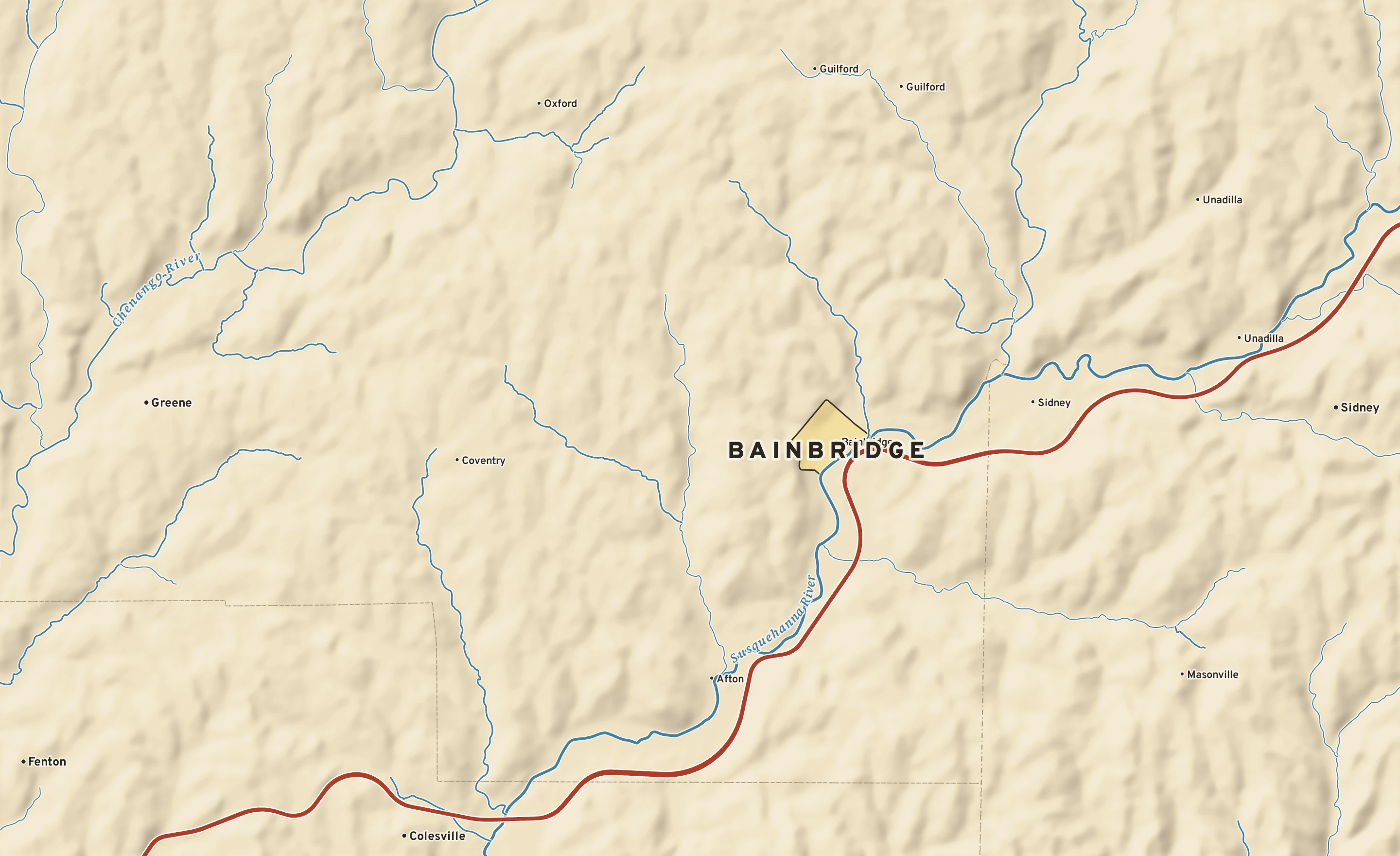 Shaded-relief atlas plate of Bainbridge, New York: rivers, roads, the city limits and where the water drains.