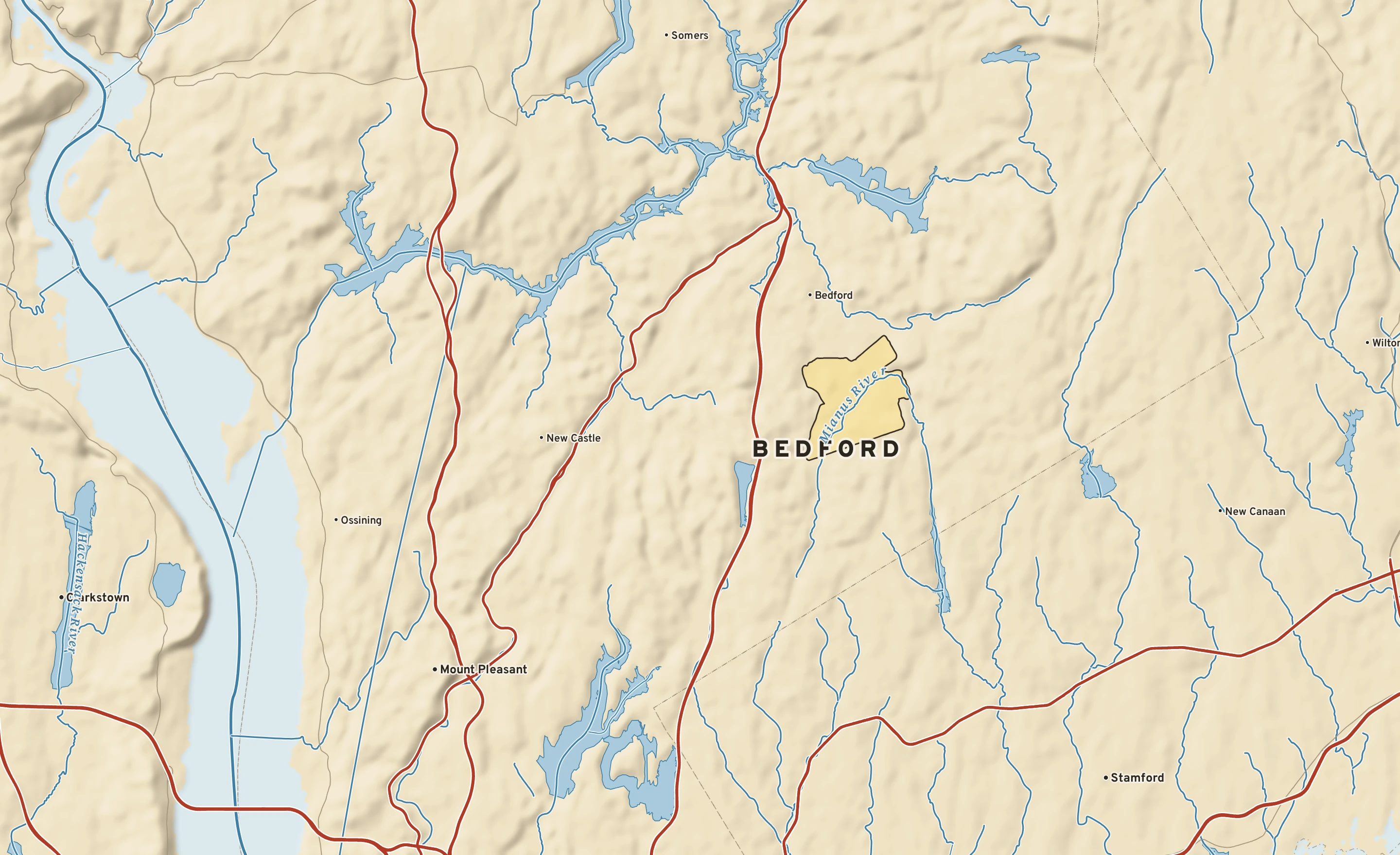 Shaded-relief atlas plate of Bedford, New York: rivers, roads, the city limits and where the water drains.