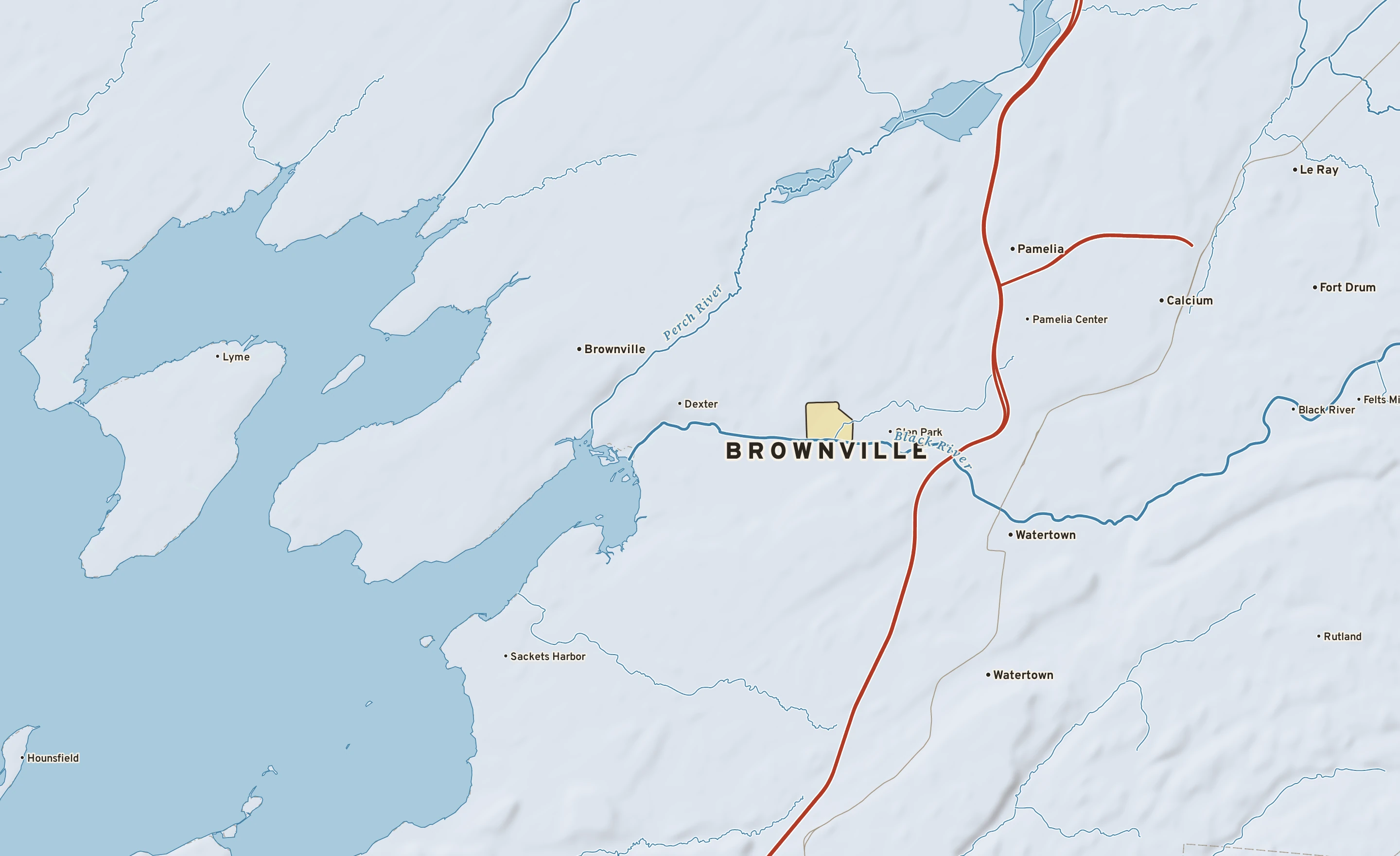 Shaded-relief atlas plate of Brownville, New York: rivers, roads, the city limits and where the water drains.