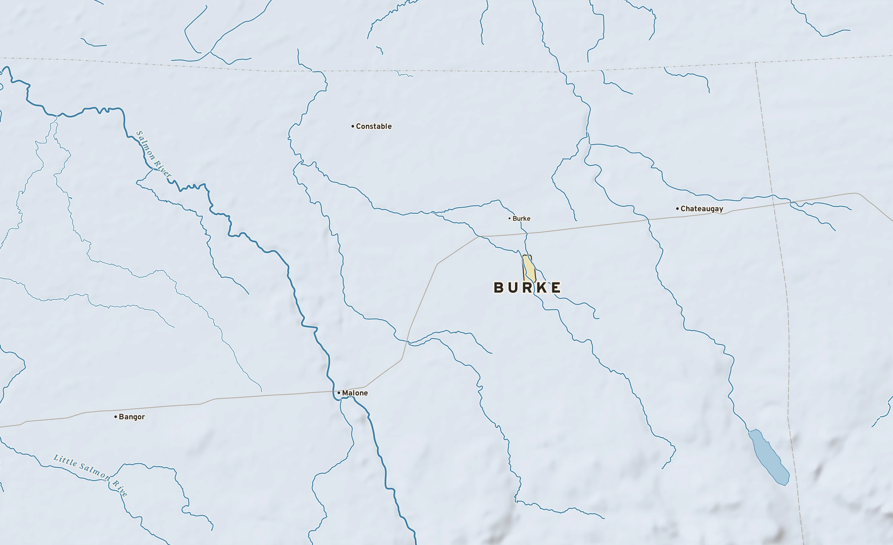 Shaded-relief atlas plate of Burke, New York: rivers, roads, the city limits and where the water drains.