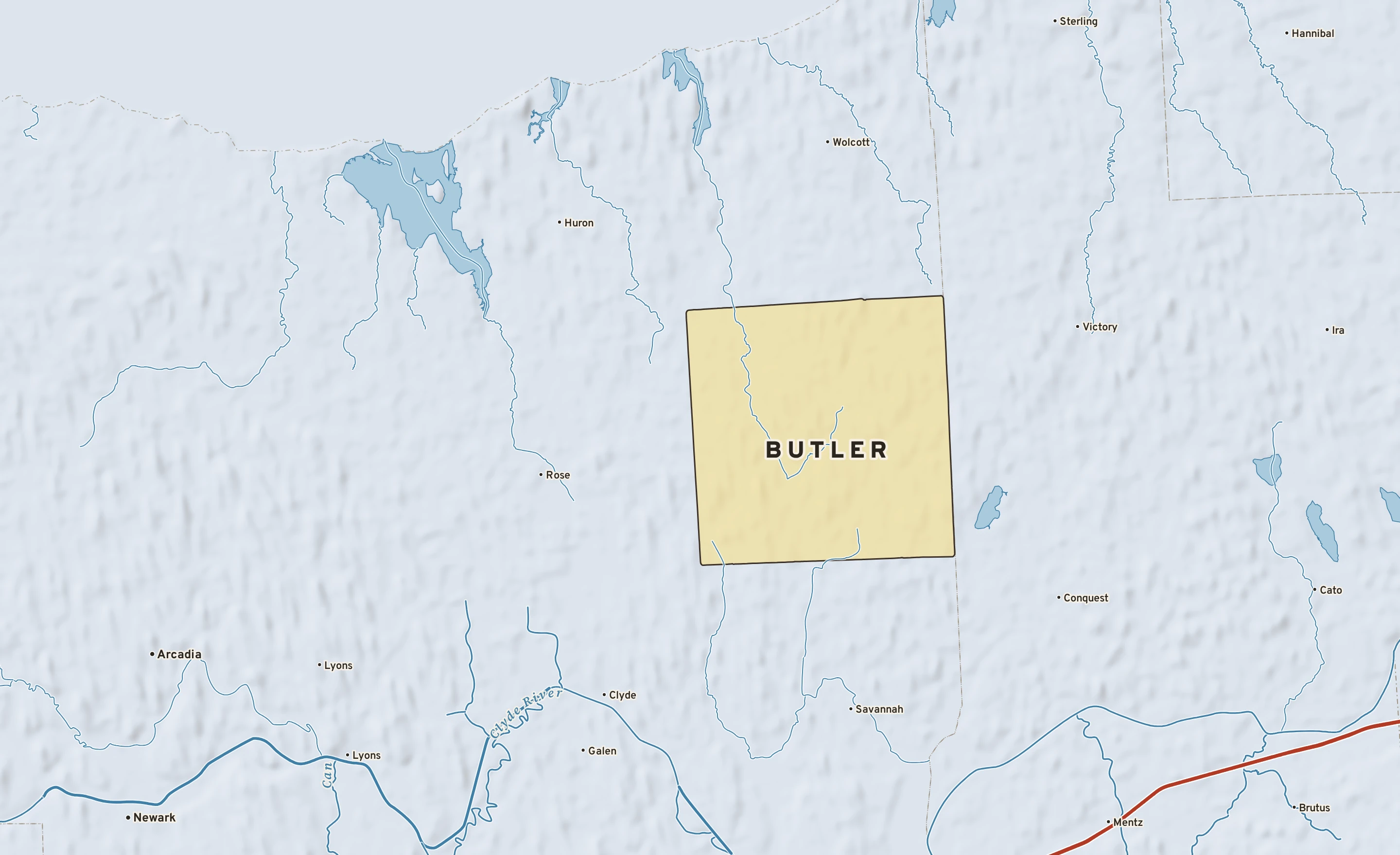 Shaded-relief atlas plate of Butler, New York: rivers, roads, the city limits and where the water drains.