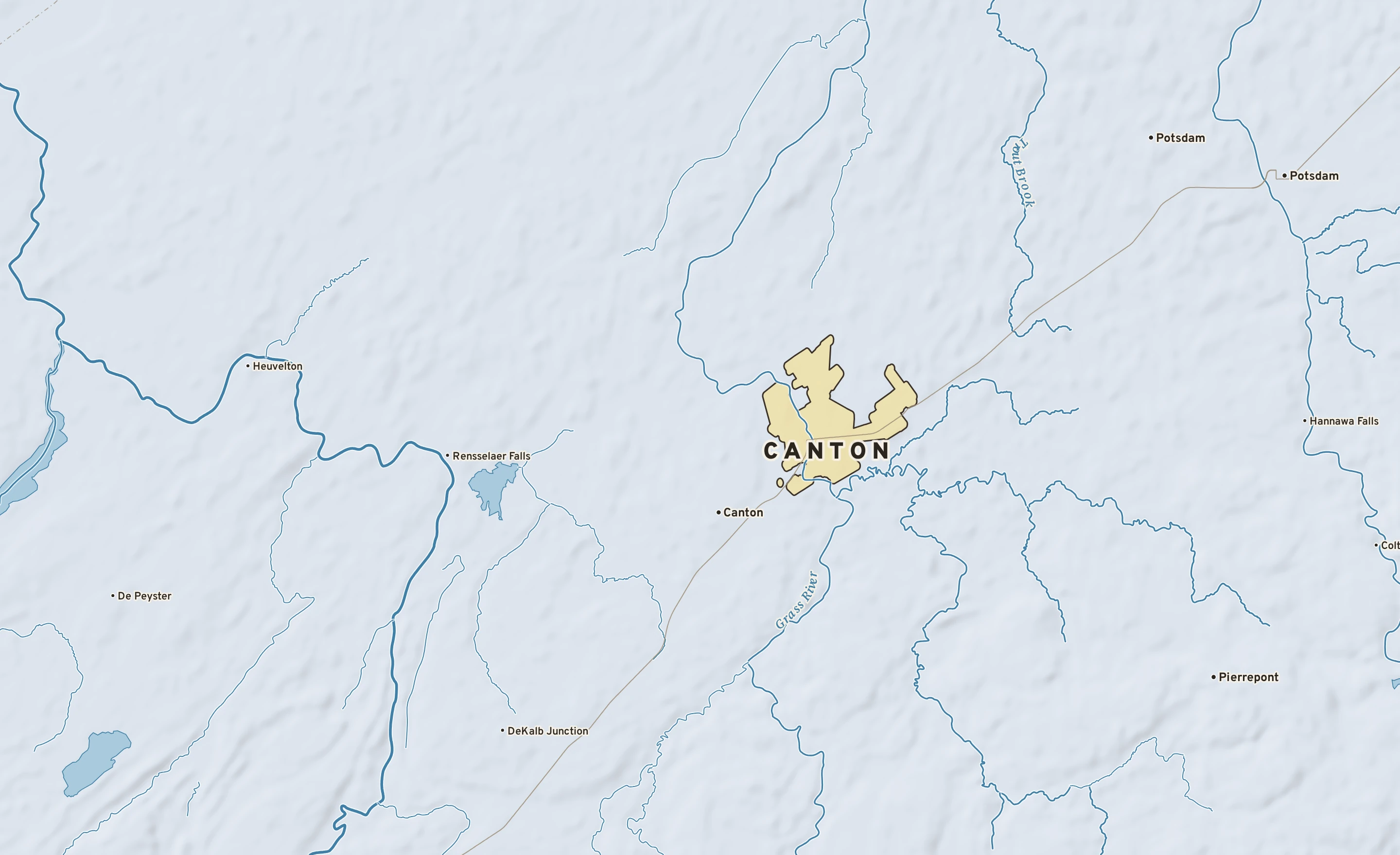Shaded-relief atlas plate of Canton, New York: rivers, roads, the city limits and where the water drains.