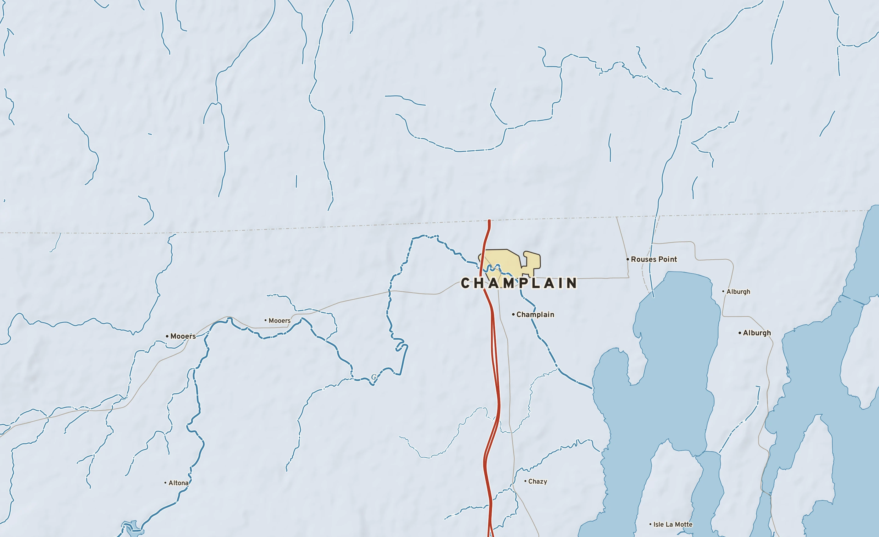 Shaded-relief atlas plate of Champlain, New York: rivers, roads, the city limits and where the water drains.