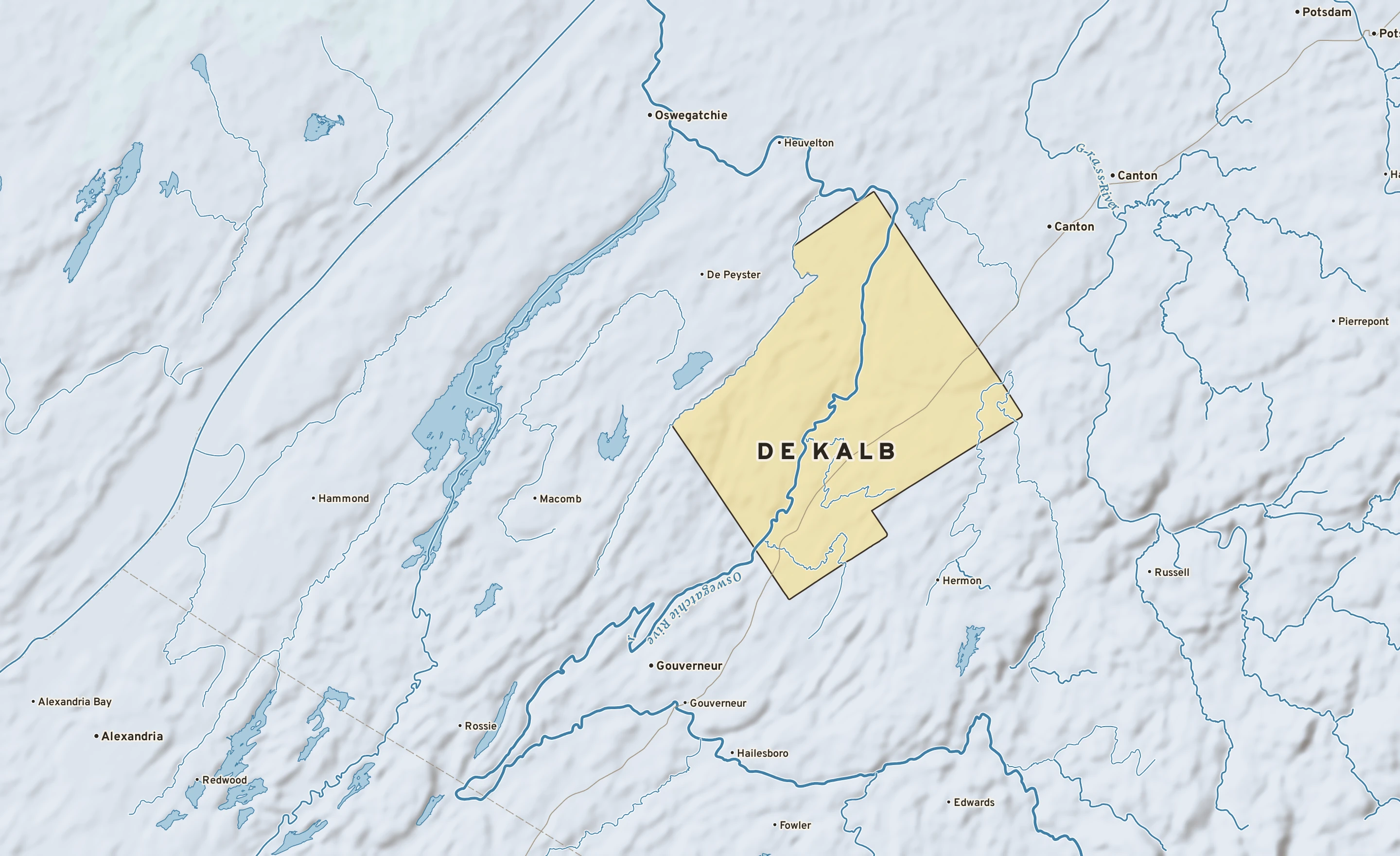 Shaded-relief atlas plate of De Kalb, New York: rivers, roads, the city limits and where the water drains.