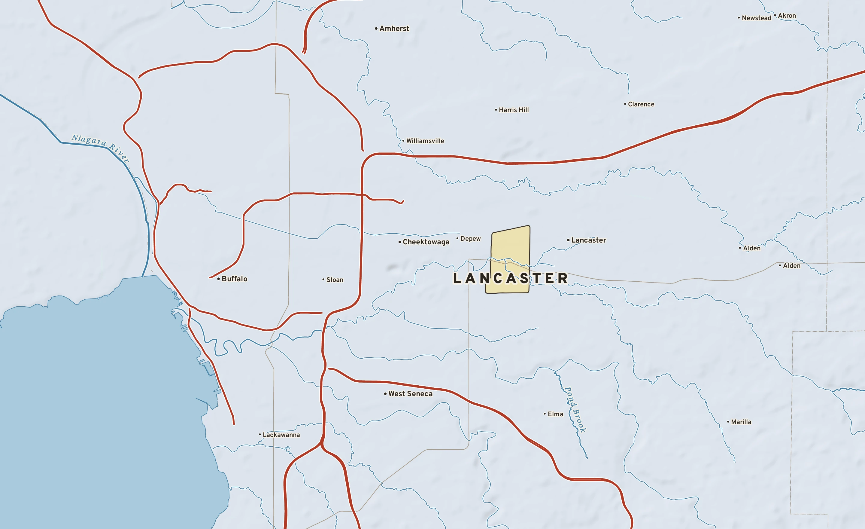 Shaded-relief atlas plate of Lancaster, New York: rivers, roads, the city limits and where the water drains.