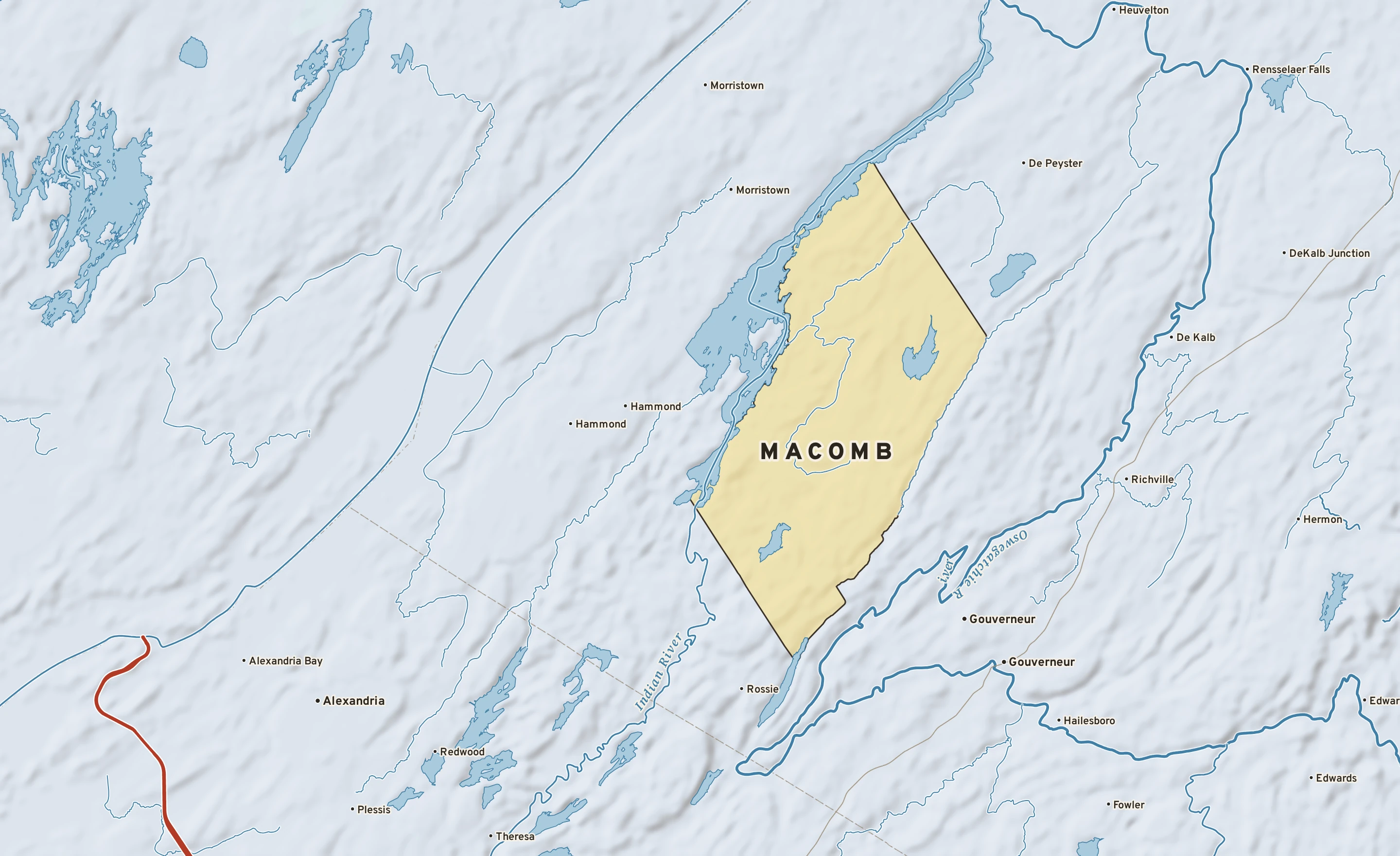 Shaded-relief atlas plate of Macomb, New York: rivers, roads, the city limits and where the water drains.