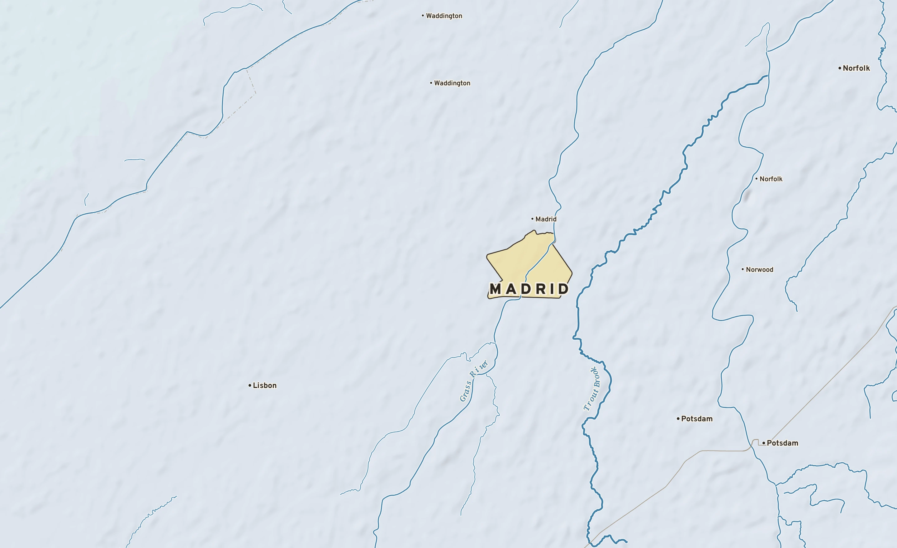 Shaded-relief atlas plate of Madrid, New York: rivers, roads, the city limits and where the water drains.