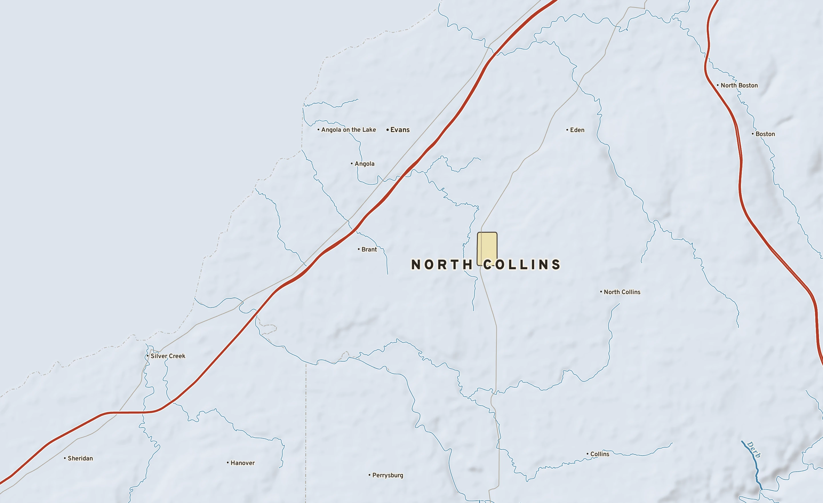 Shaded-relief atlas plate of North Collins, New York: rivers, roads, the city limits and where the water drains.