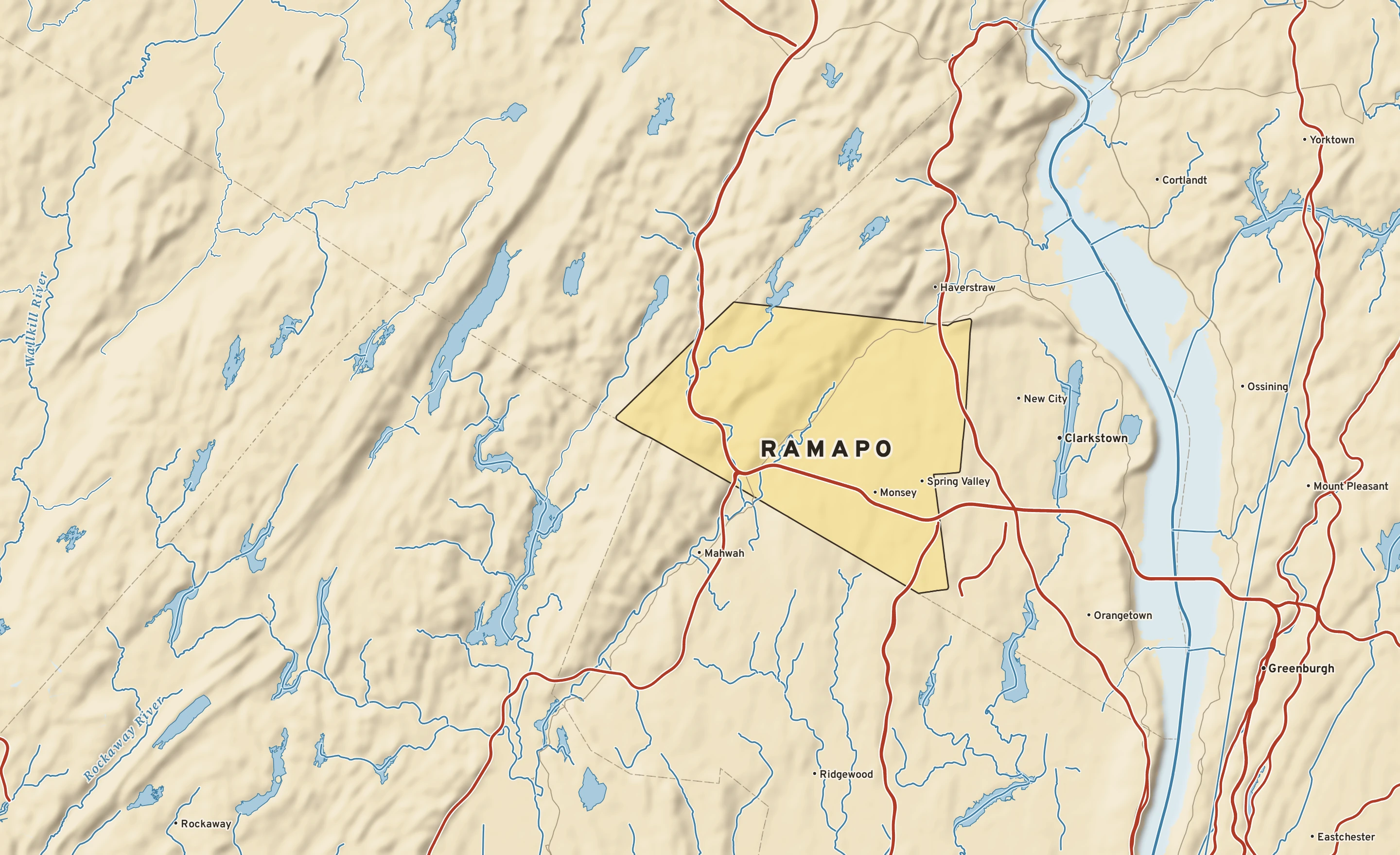 Shaded-relief atlas plate of Ramapo, New York: rivers, roads, the city limits and where the water drains.