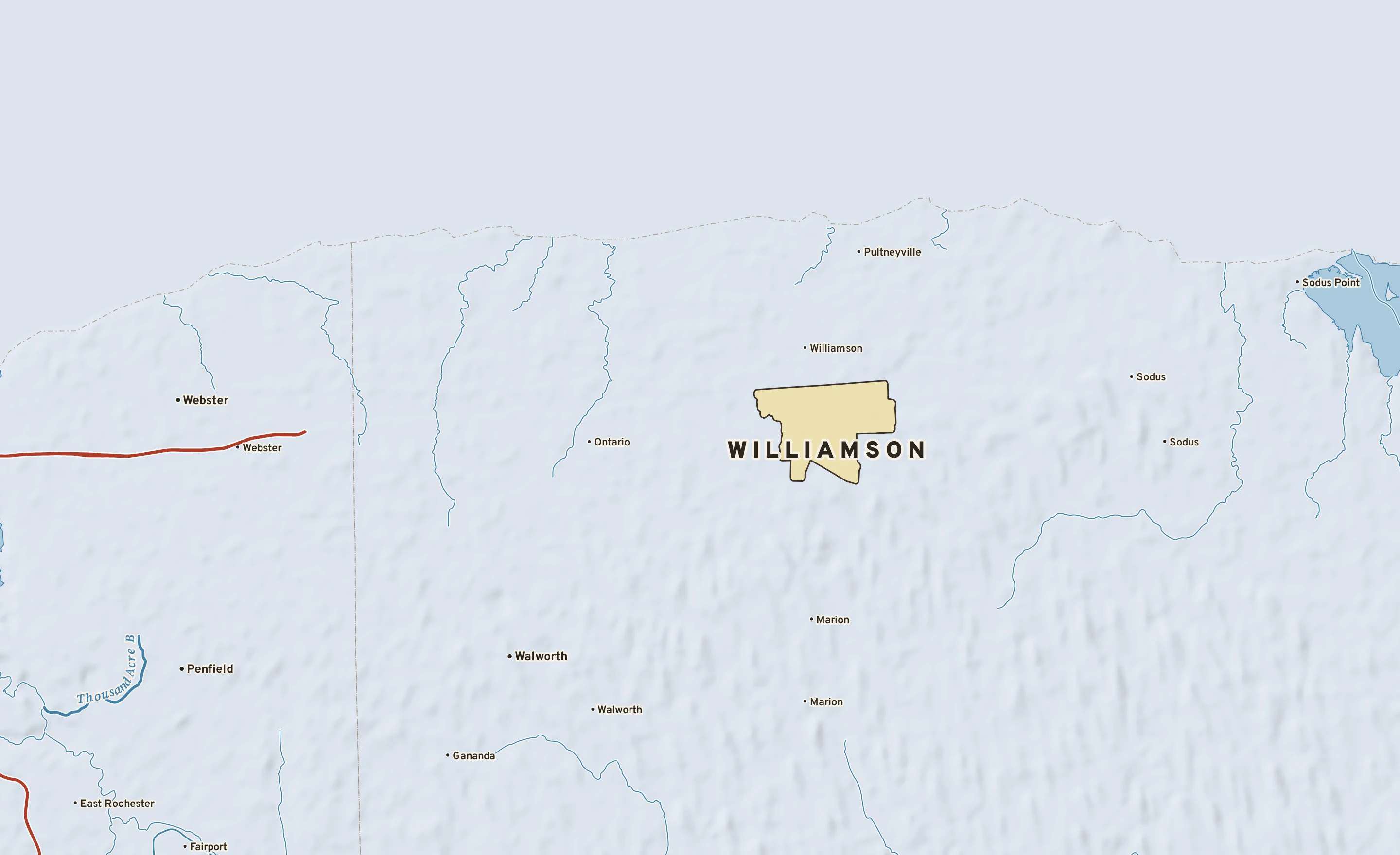 Shaded-relief atlas plate of Williamson, New York: rivers, roads, the city limits and where the water drains.