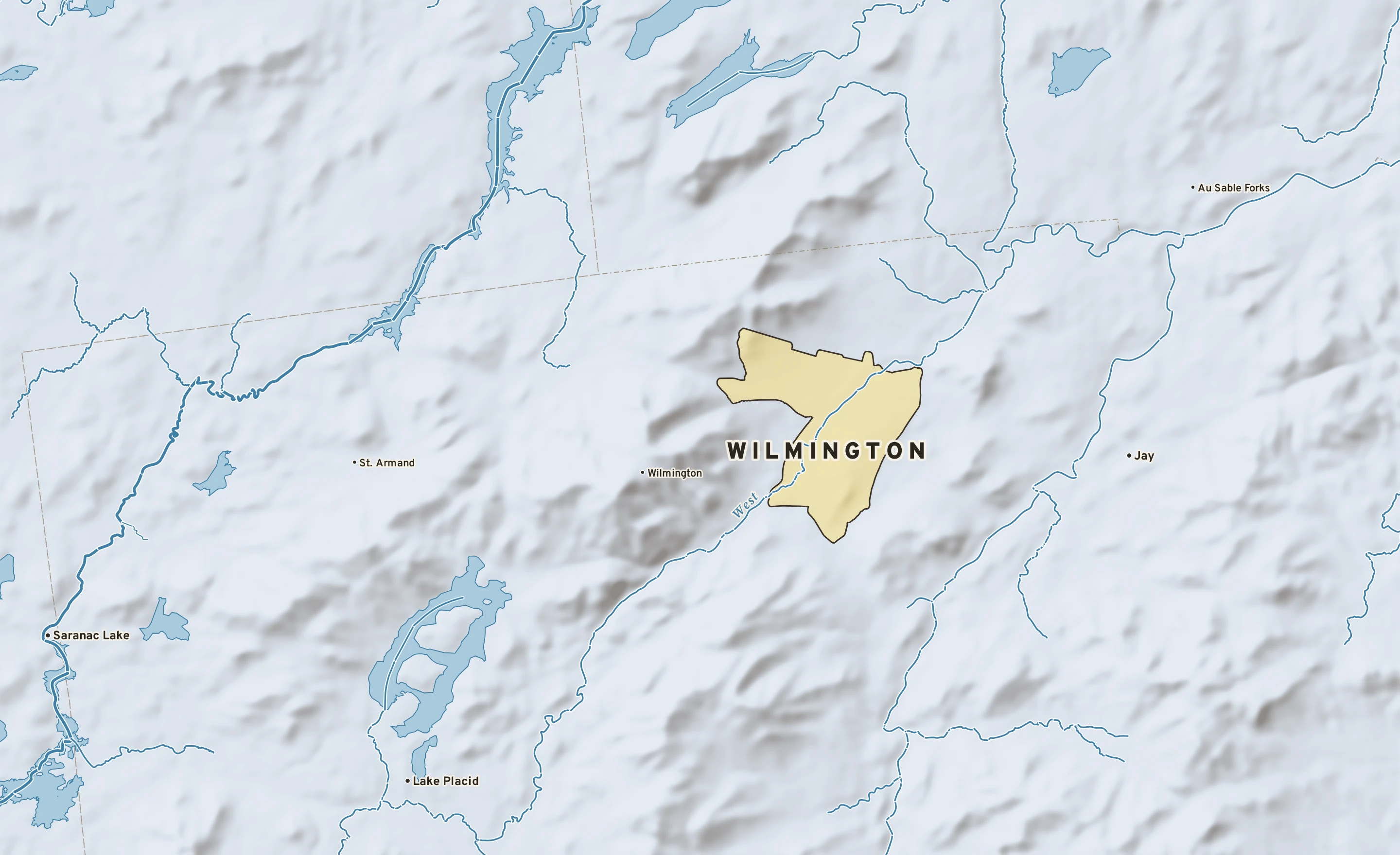 Shaded-relief atlas plate of Wilmington, New York: rivers, roads, the city limits and where the water drains.