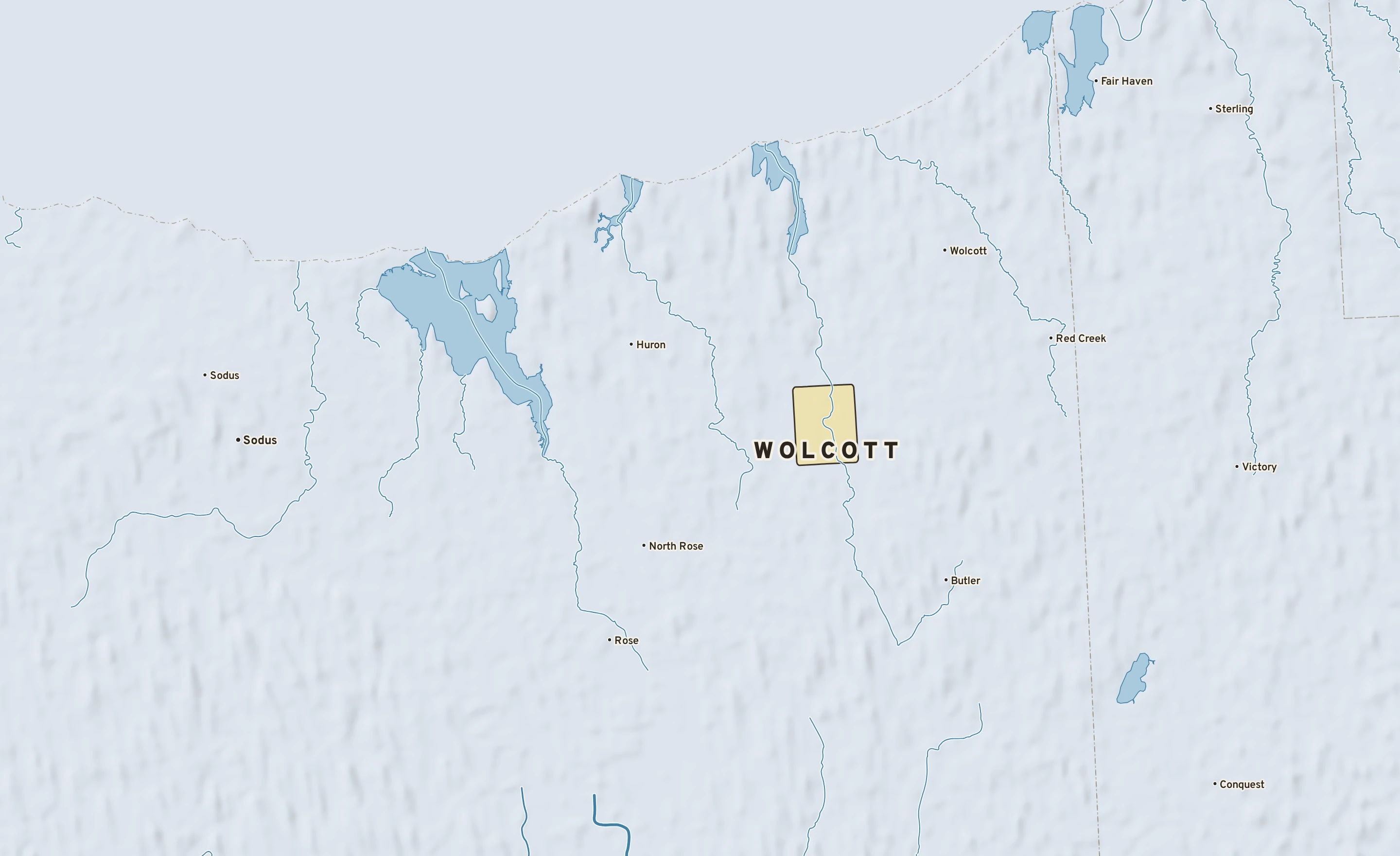 Shaded-relief atlas plate of Wolcott, New York: rivers, roads, the city limits and where the water drains.