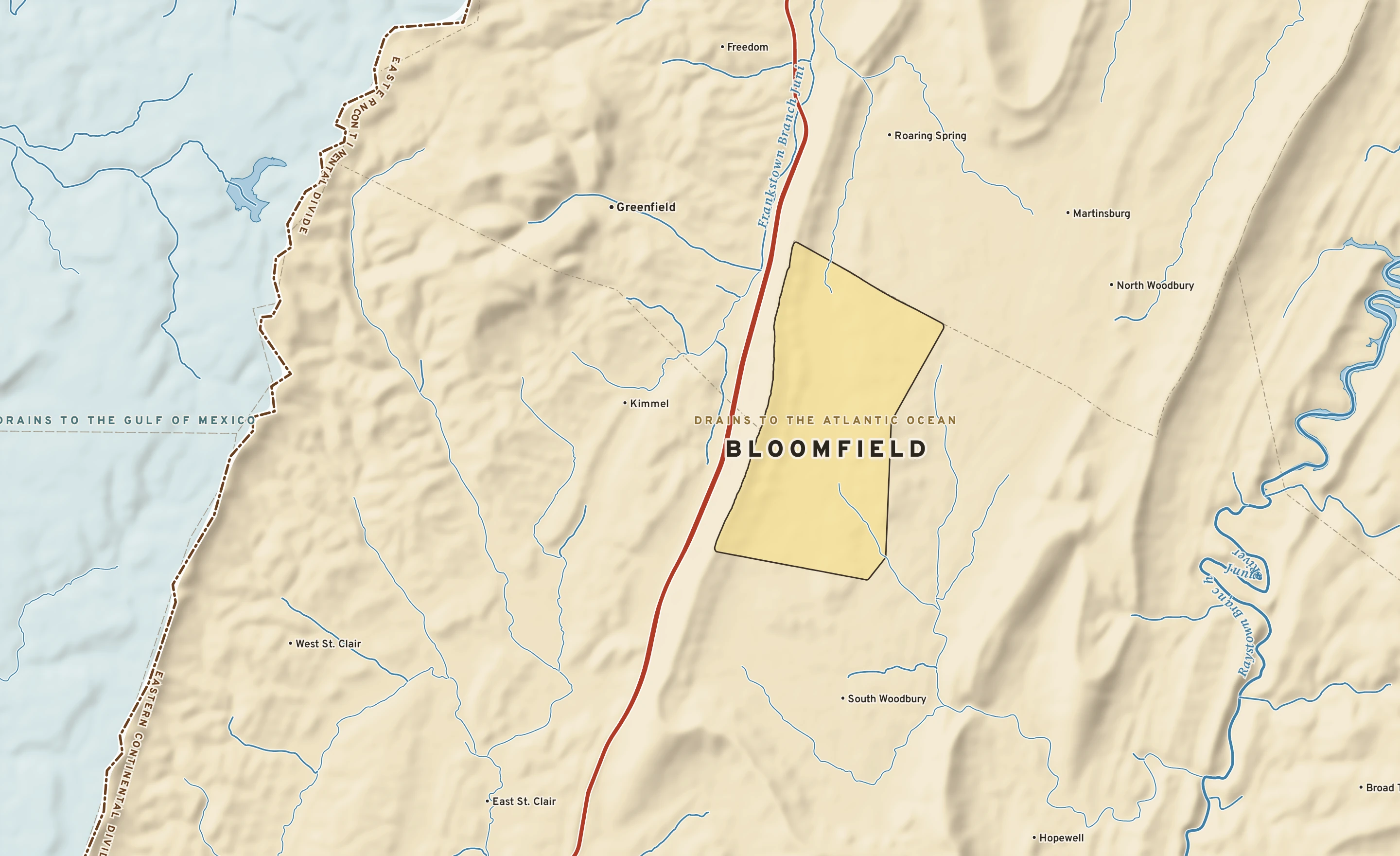 Shaded-relief atlas plate of Bloomfield, Pennsylvania: rivers, roads, the city limits and where the water drains.