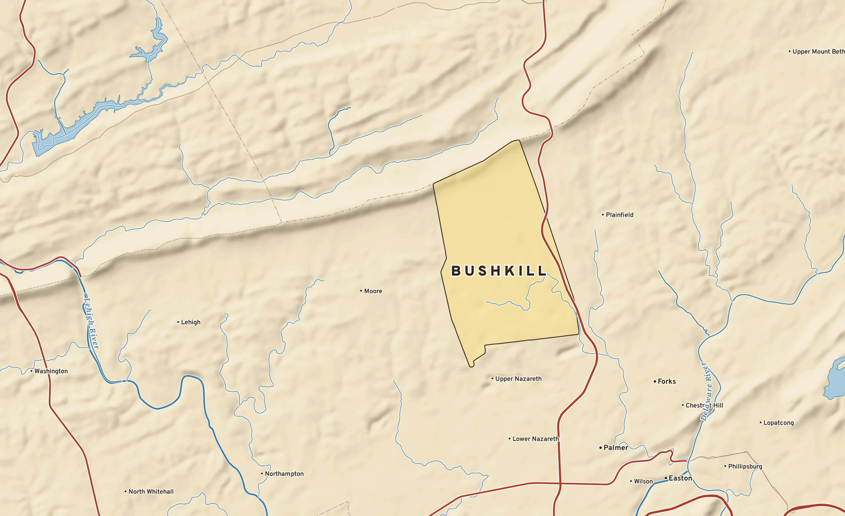 Shaded-relief atlas plate of Bushkill, Pennsylvania: rivers, roads, the city limits and where the water drains.