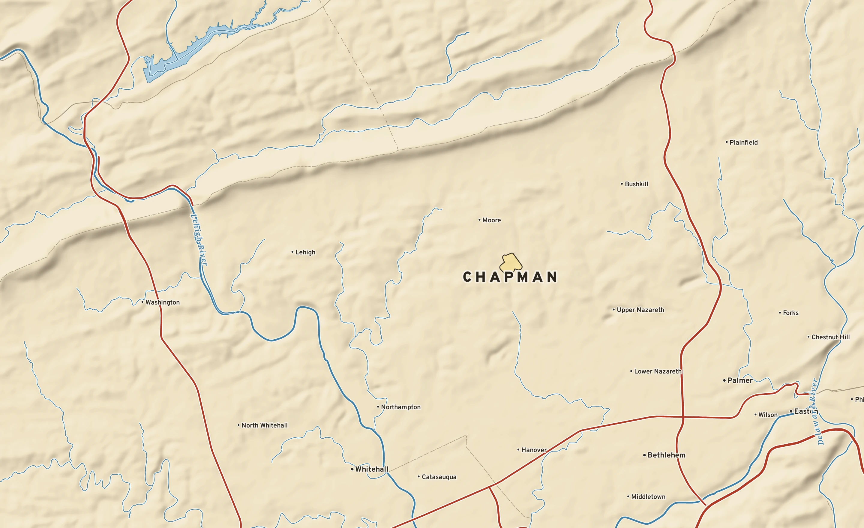 Shaded-relief atlas plate of Chapman, Pennsylvania: rivers, roads, the city limits and where the water drains.