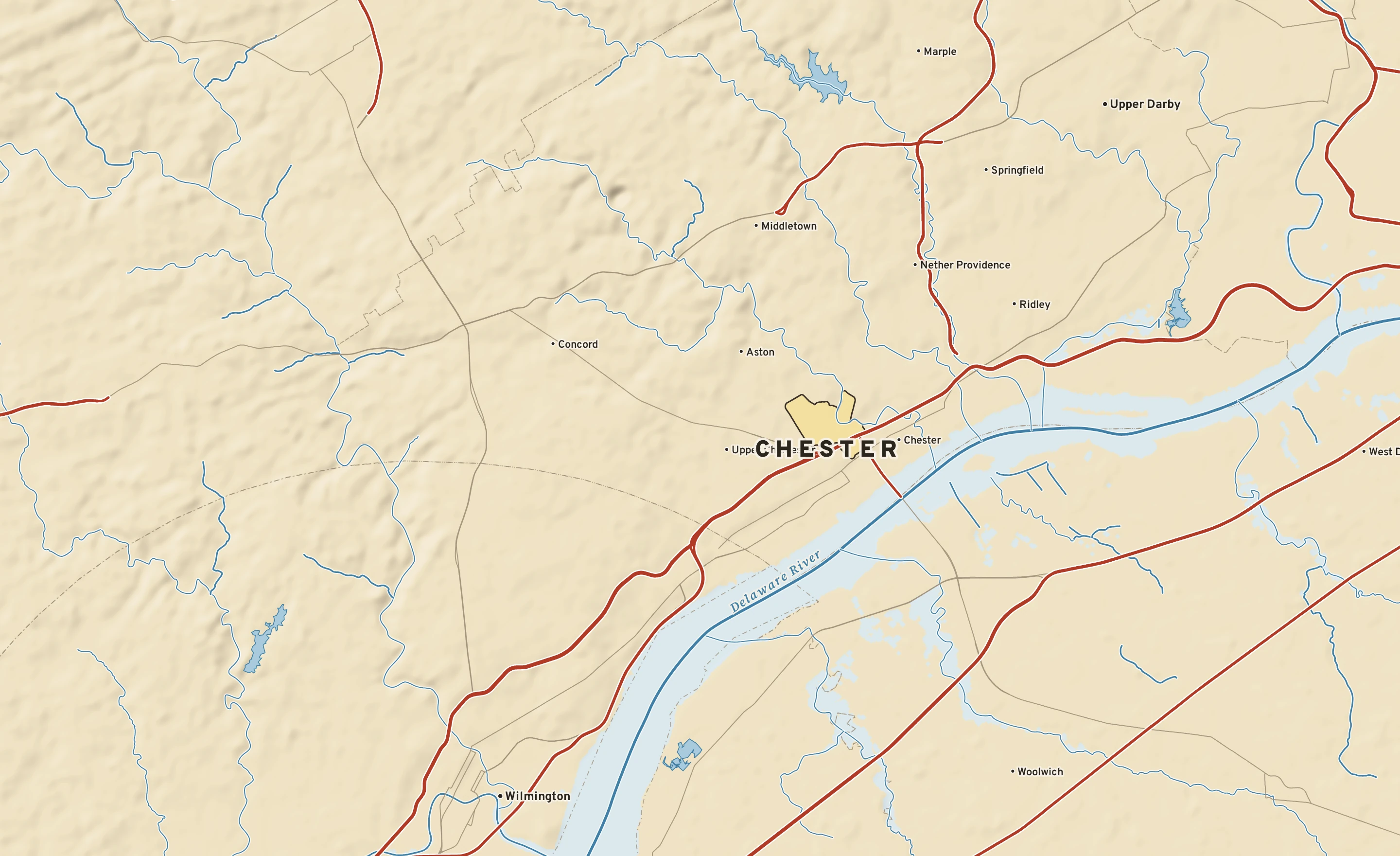 Shaded-relief atlas plate of Chester, Pennsylvania: rivers, roads, the city limits and where the water drains.