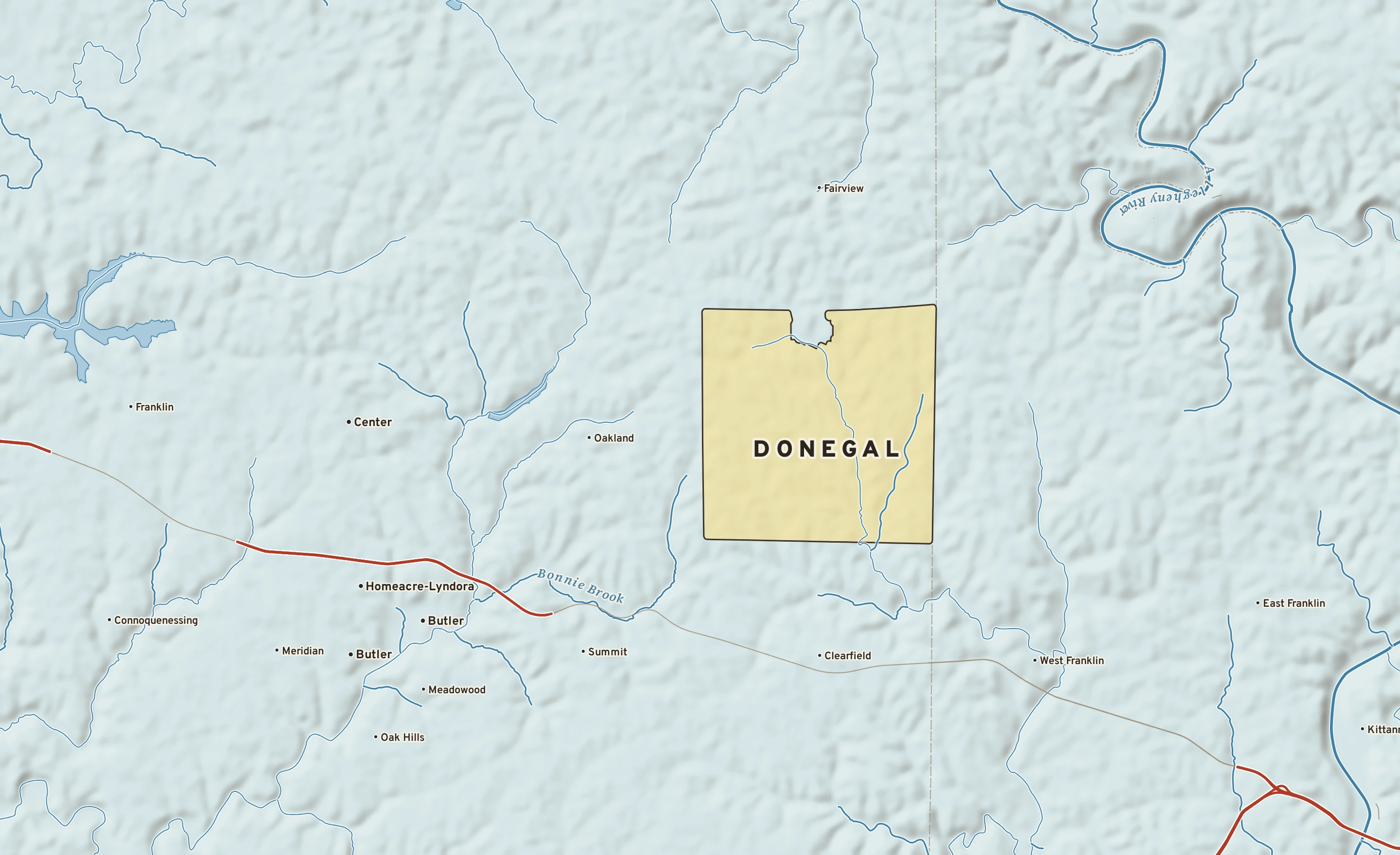 Shaded-relief atlas plate of Donegal, Pennsylvania: rivers, roads, the city limits and where the water drains.