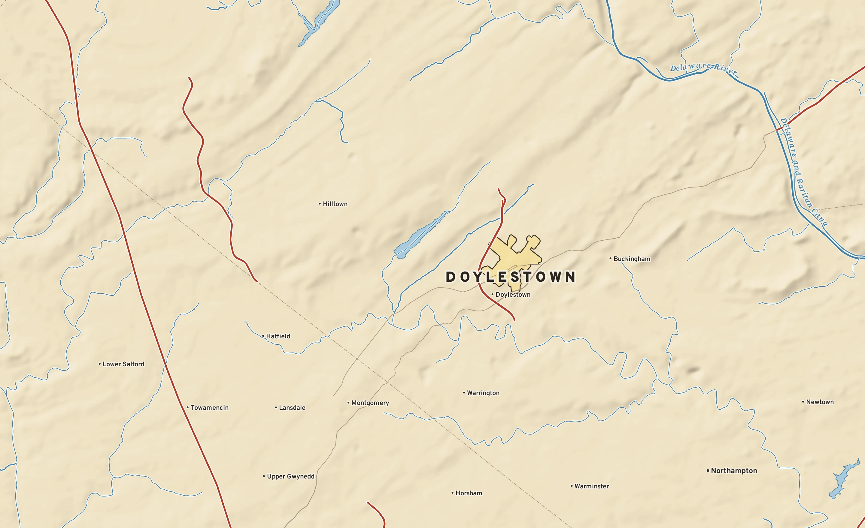 Shaded-relief atlas plate of Doylestown, Pennsylvania: rivers, roads, the city limits and where the water drains.