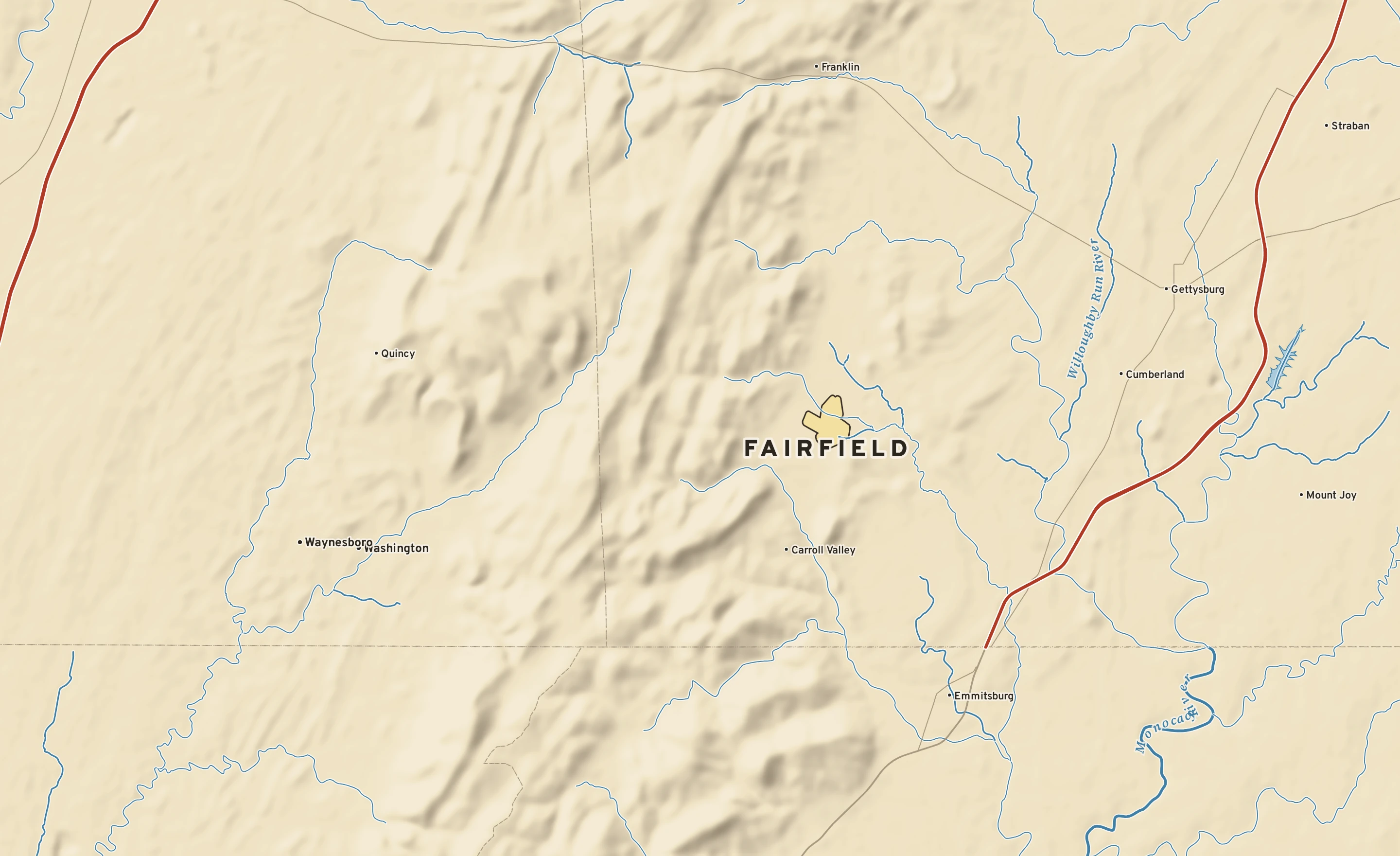 Shaded-relief atlas plate of Fairfield, Pennsylvania: rivers, roads, the city limits and where the water drains.