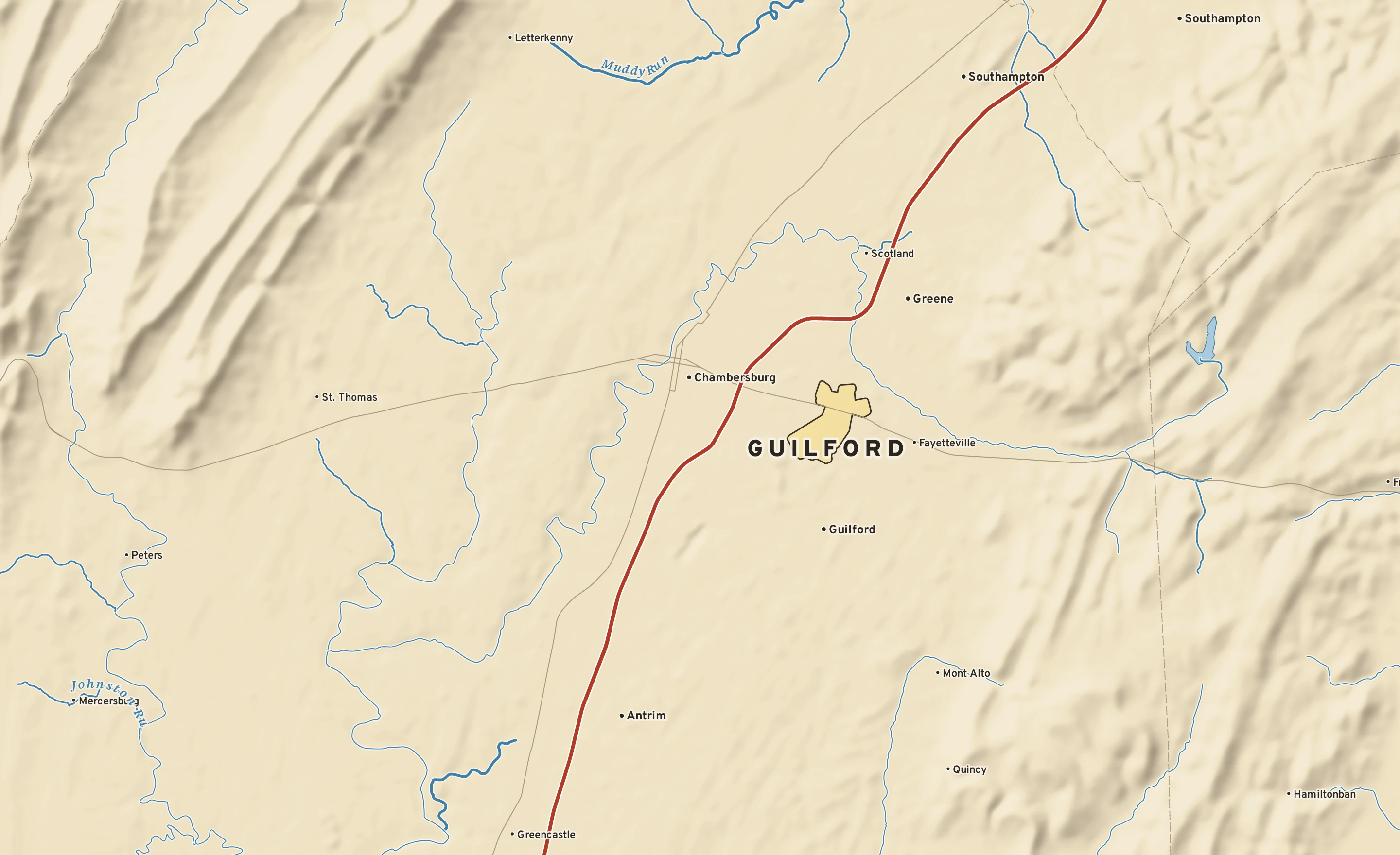 Shaded-relief atlas plate of Guilford, Pennsylvania: rivers, roads, the city limits and where the water drains.