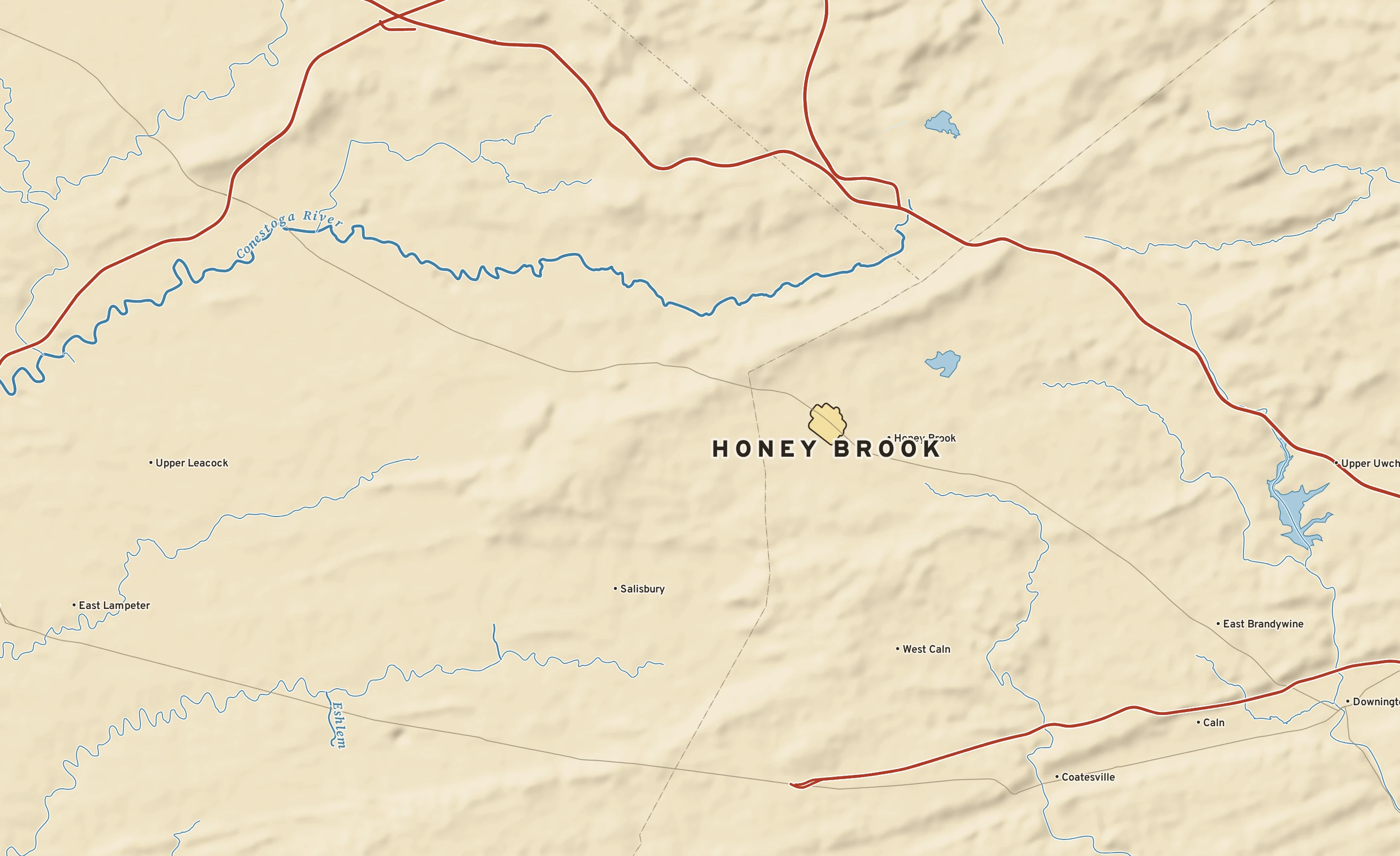 Shaded-relief atlas plate of Honey Brook, Pennsylvania: rivers, roads, the city limits and where the water drains.
