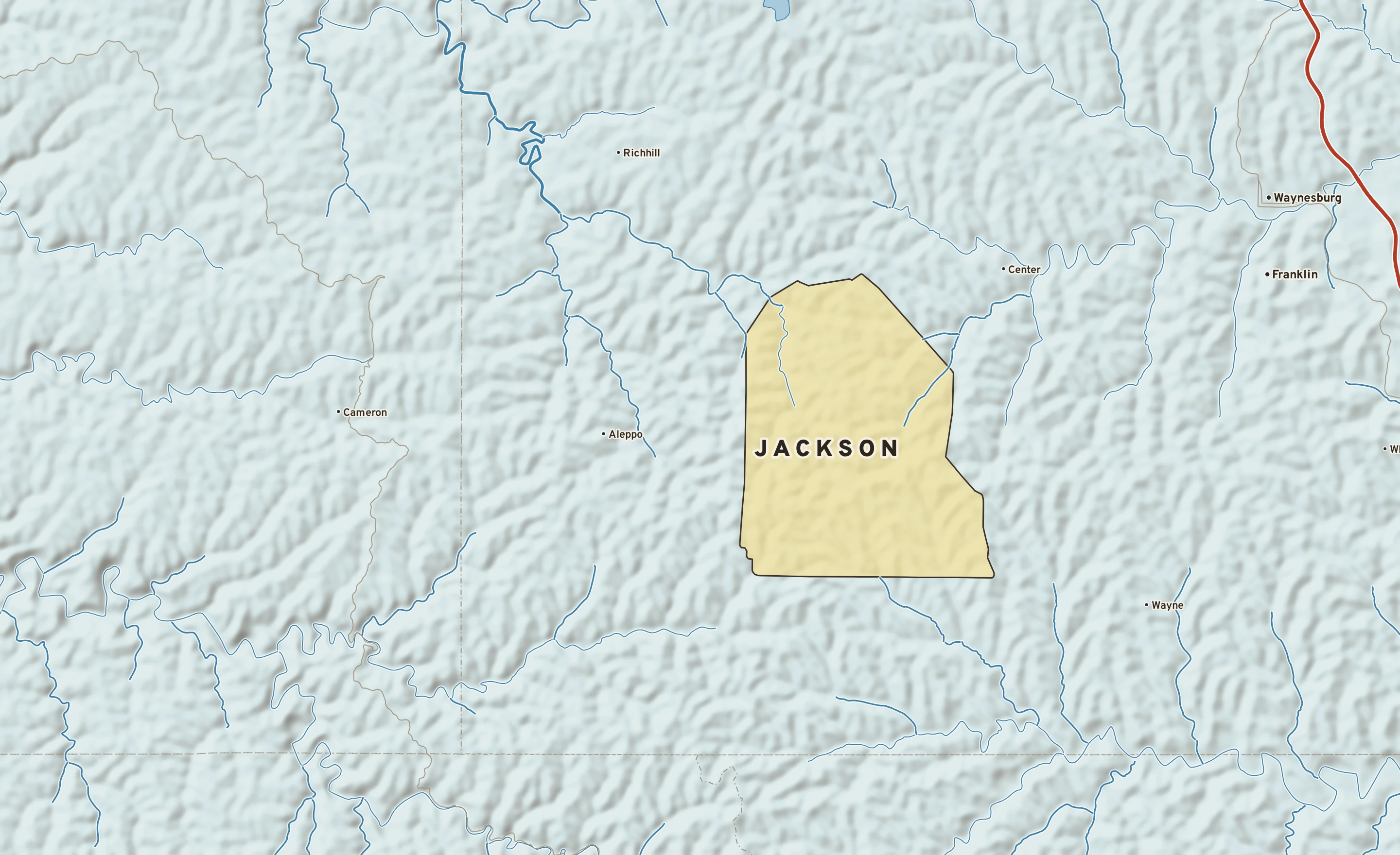 Shaded-relief atlas plate of Jackson, Pennsylvania: rivers, roads, the city limits and where the water drains.