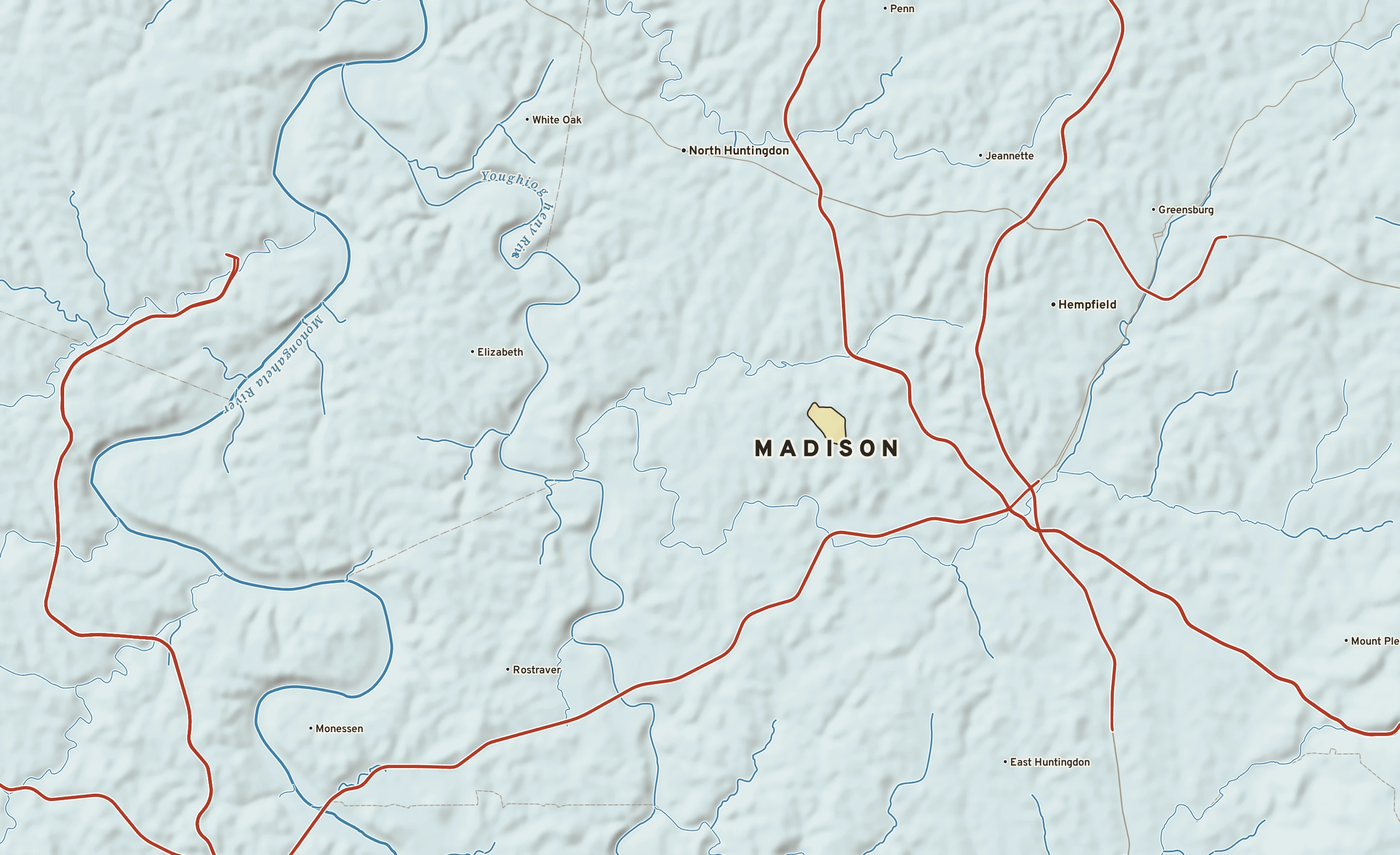 Shaded-relief atlas plate of Madison, Pennsylvania: rivers, roads, the city limits and where the water drains.