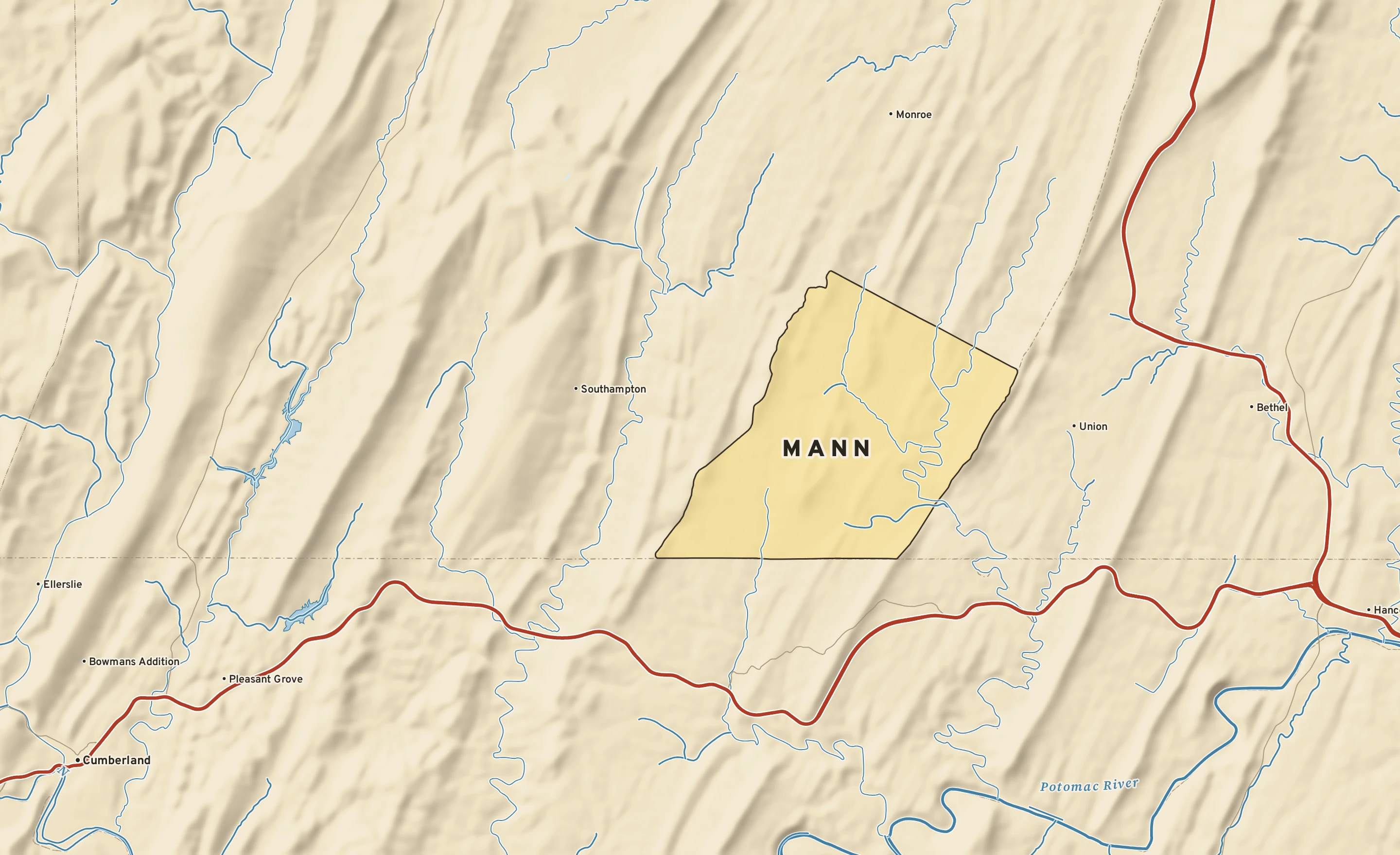 Shaded-relief atlas plate of Mann, Pennsylvania: rivers, roads, the city limits and where the water drains.