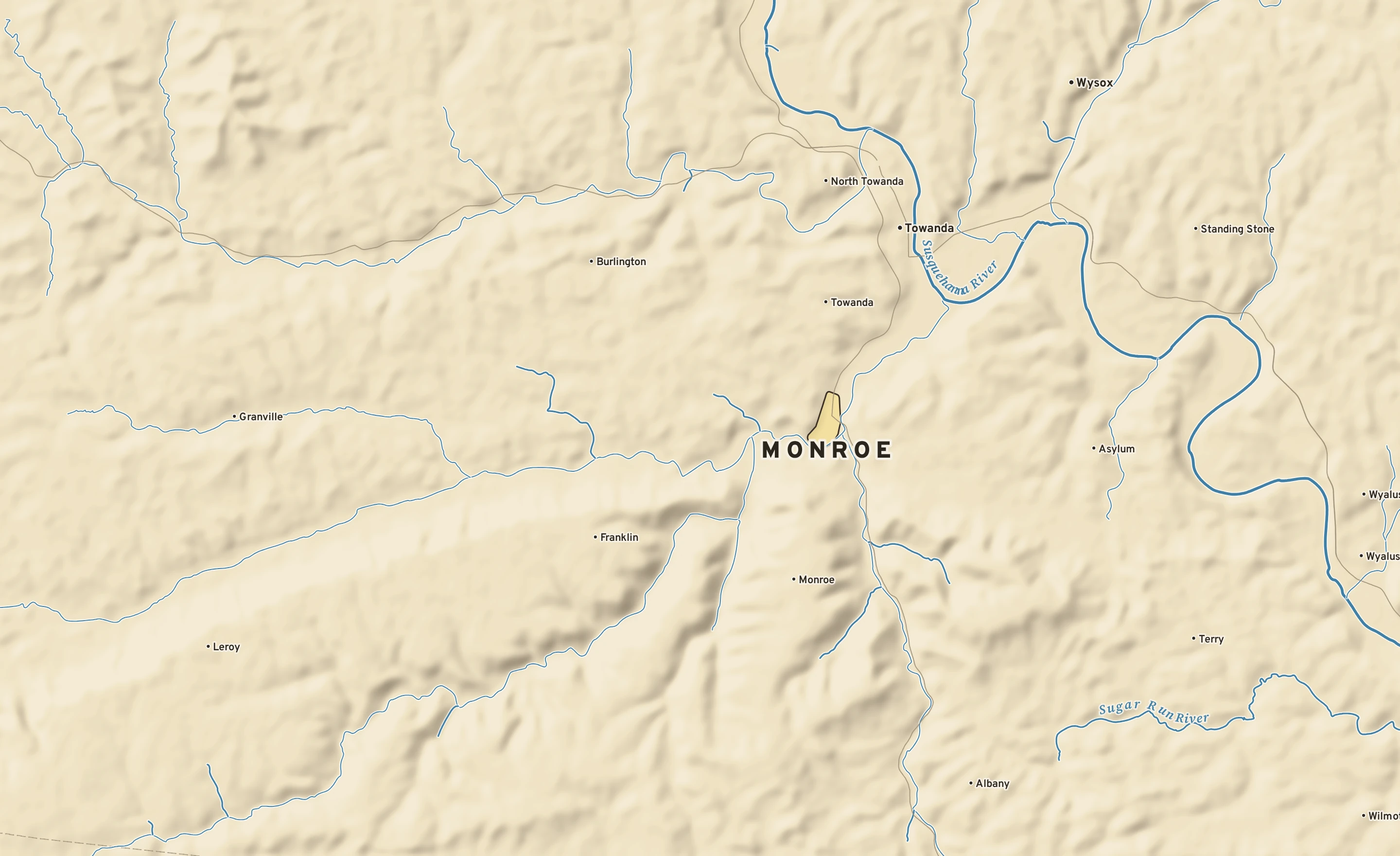 Shaded-relief atlas plate of Monroe, Pennsylvania: rivers, roads, the city limits and where the water drains.