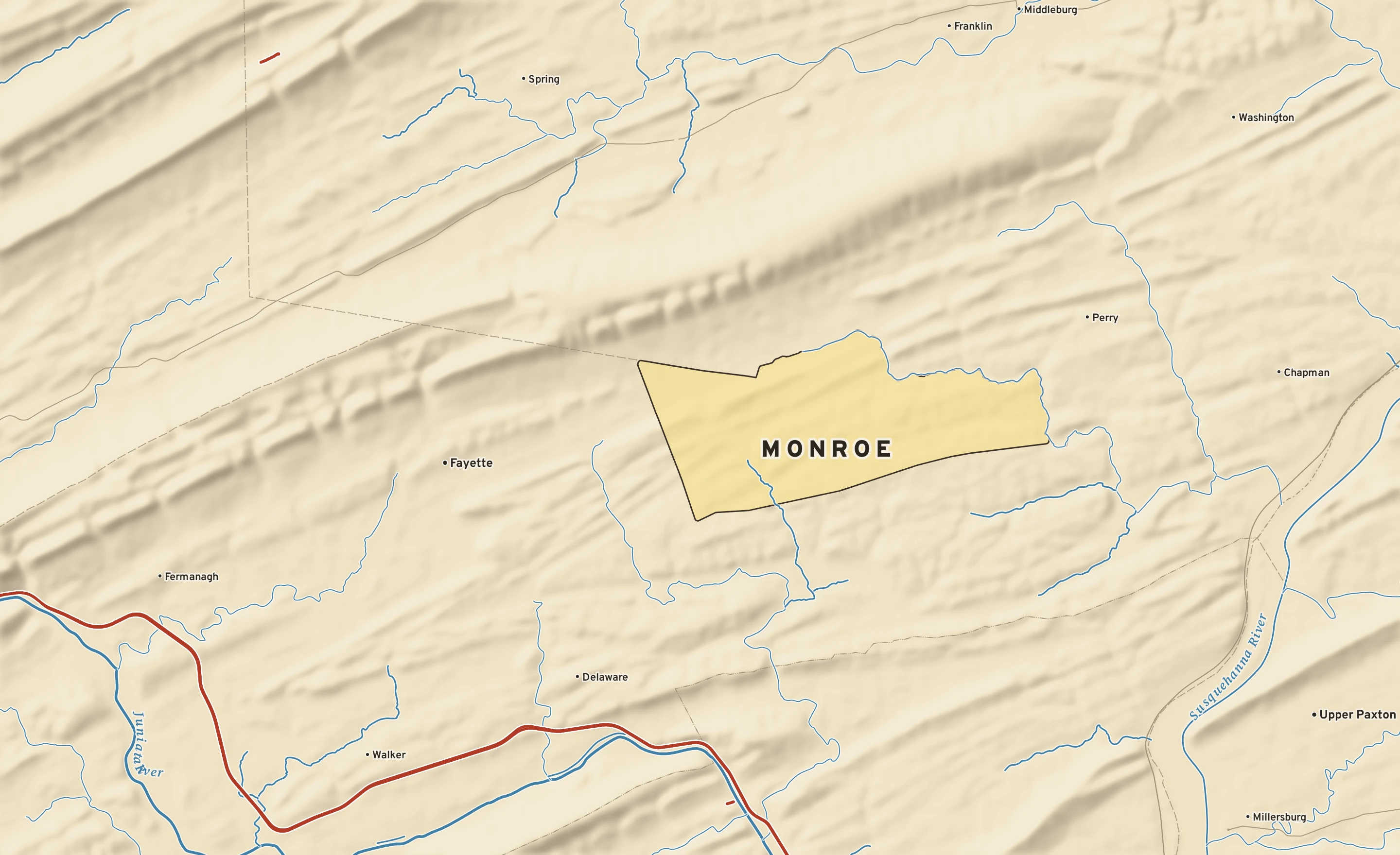 Shaded-relief atlas plate of Monroe, Pennsylvania: rivers, roads, the city limits and where the water drains.