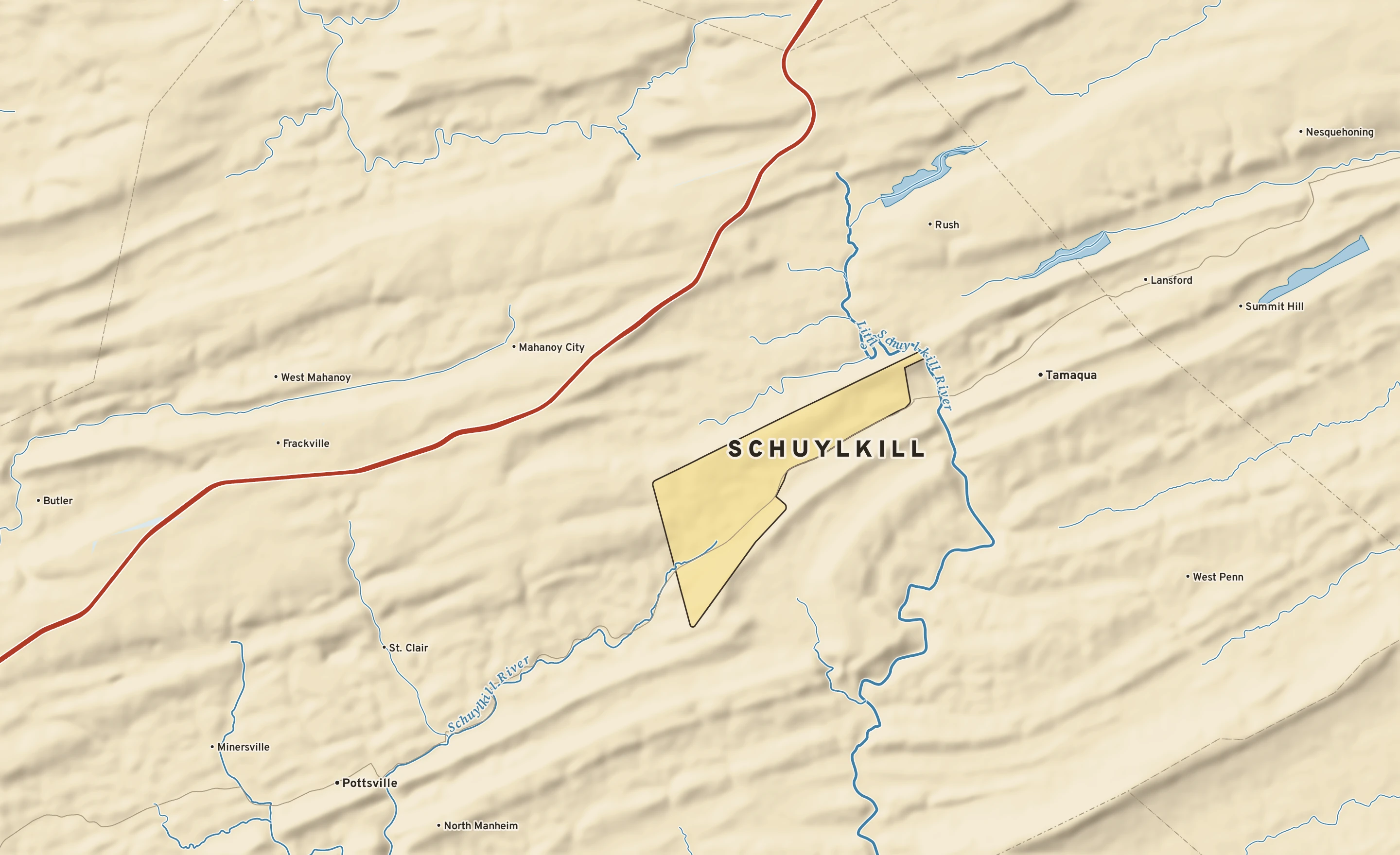 Shaded-relief atlas plate of Schuylkill, Pennsylvania: rivers, roads, the city limits and where the water drains.