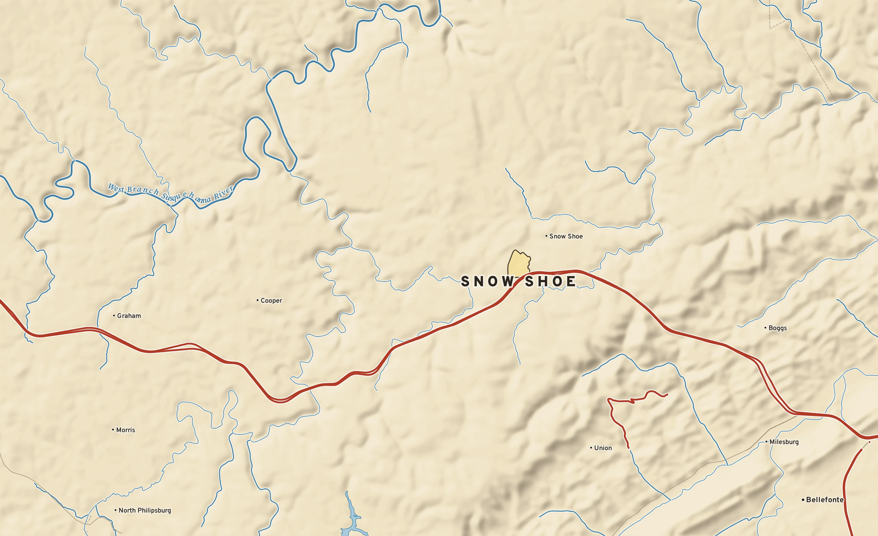 Shaded-relief atlas plate of Snow Shoe, Pennsylvania: rivers, roads, the city limits and where the water drains.