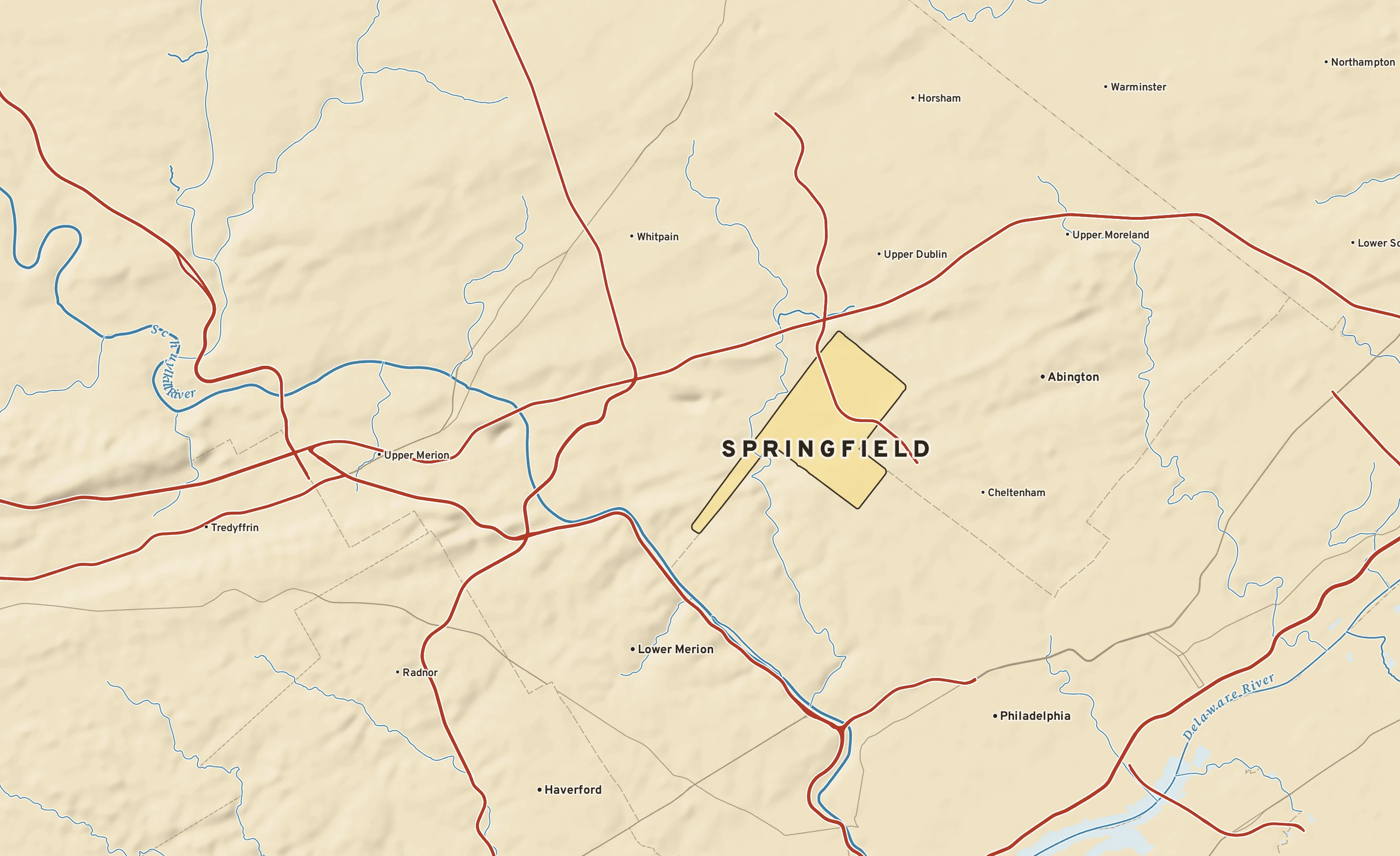 Shaded-relief atlas plate of Springfield, Pennsylvania: rivers, roads, the city limits and where the water drains.