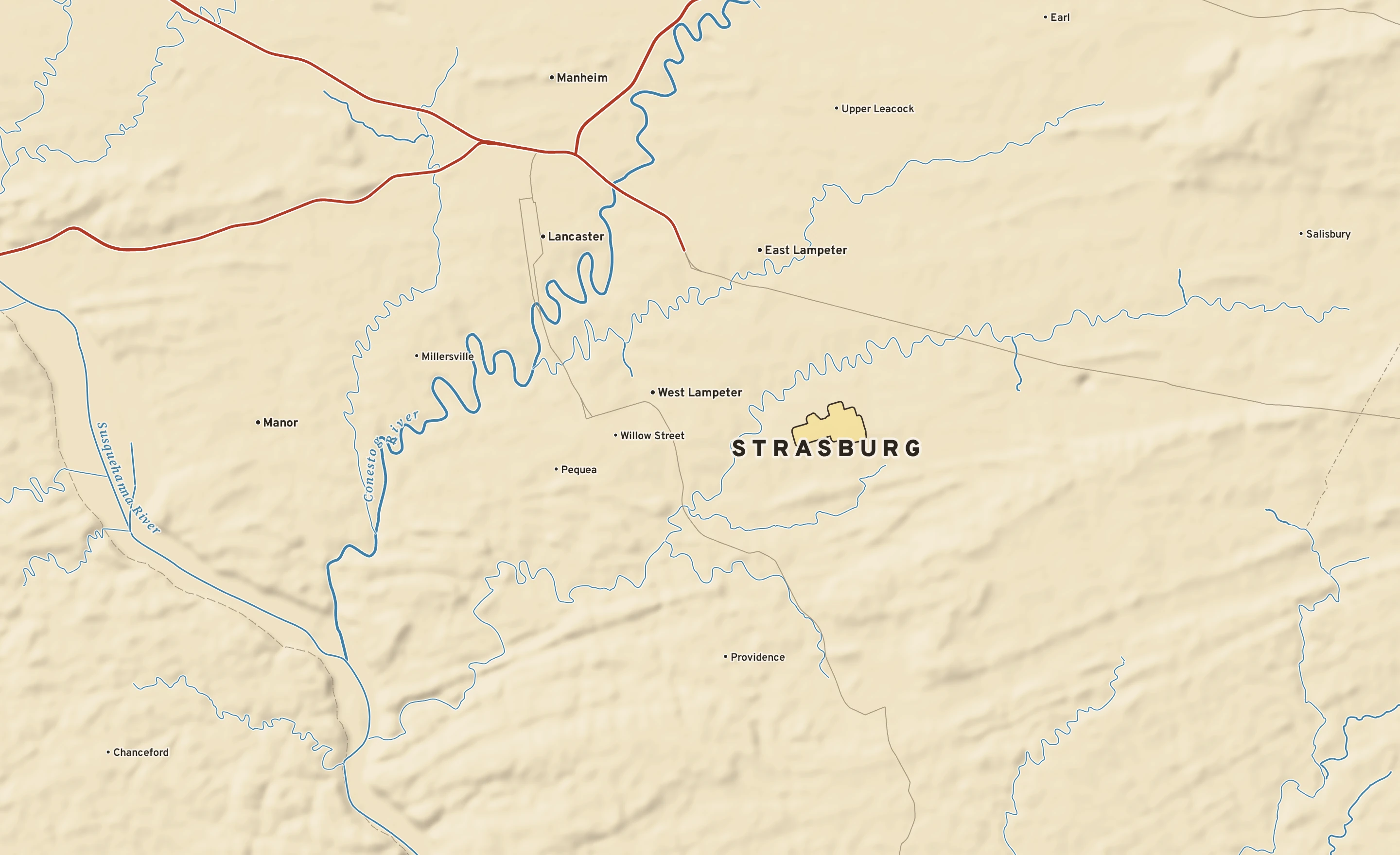 Shaded-relief atlas plate of Strasburg, Pennsylvania: rivers, roads, the city limits and where the water drains.