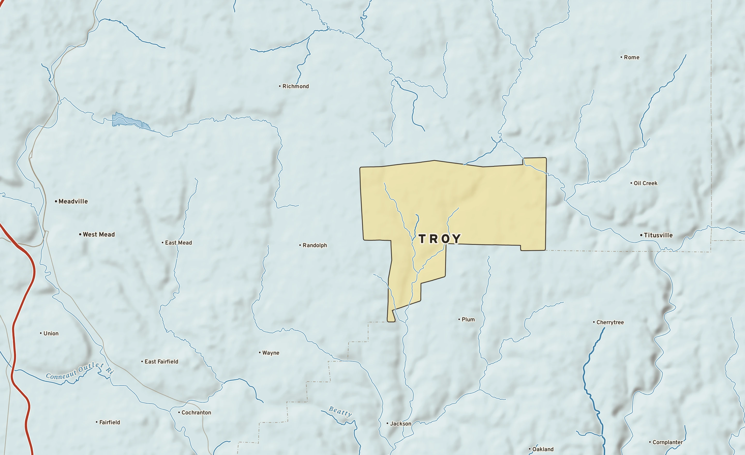 Shaded-relief atlas plate of Troy, Pennsylvania: rivers, roads, the city limits and where the water drains.