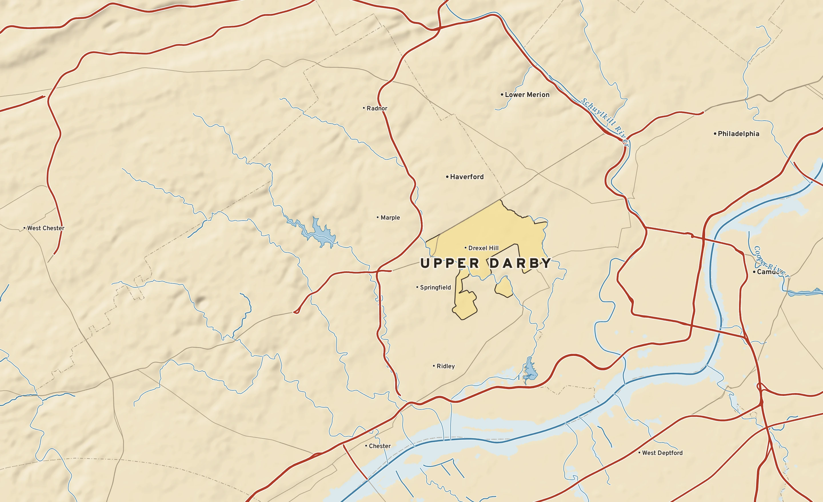 Shaded-relief atlas plate of Upper Darby, Pennsylvania: rivers, roads, the city limits and where the water drains.